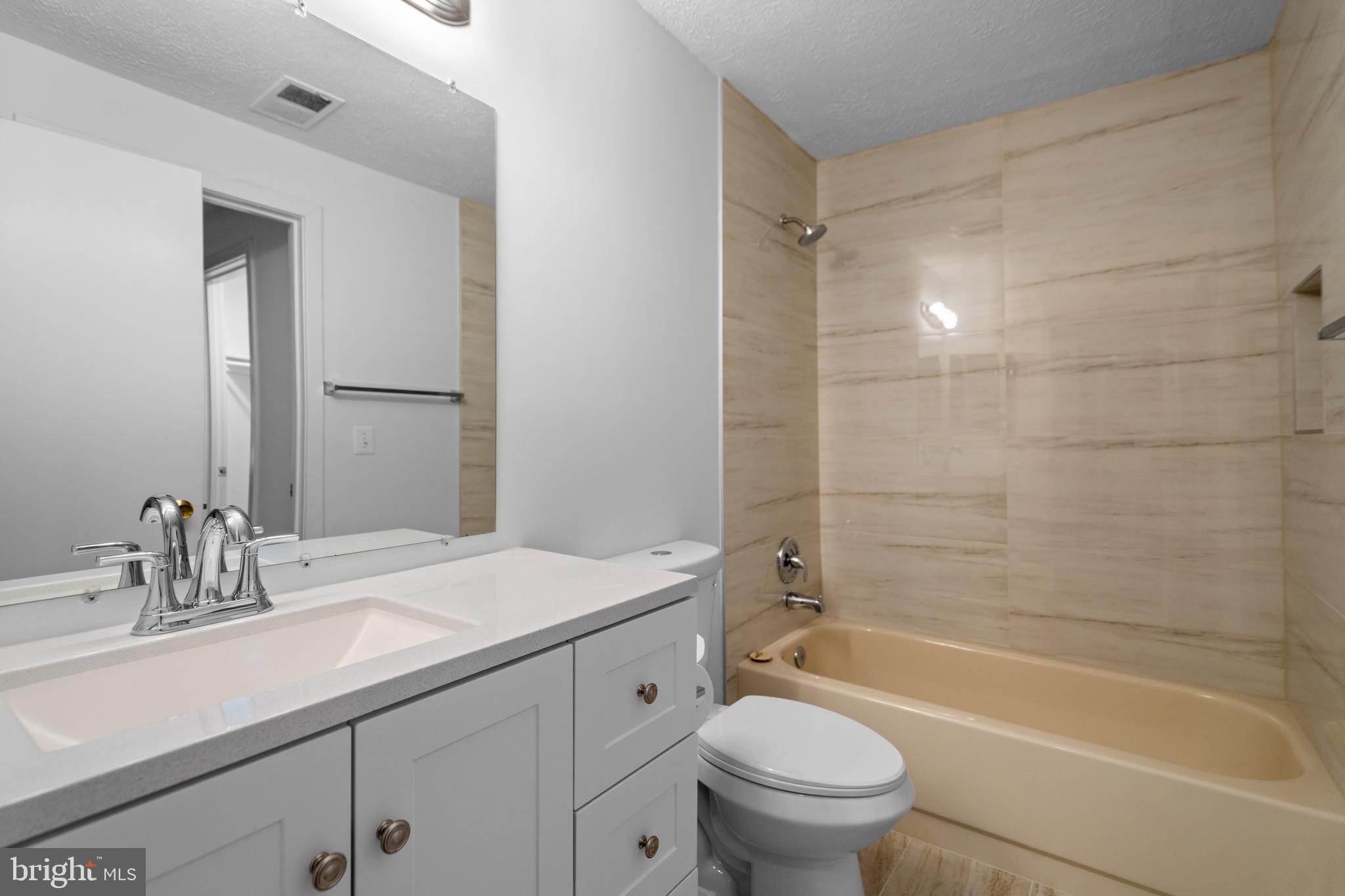 11733 Summerchase Circle, Unit 1733C Reston, VA 20194 - Photo 14 of 33 Fresh second bath with access from 2BR and hall.