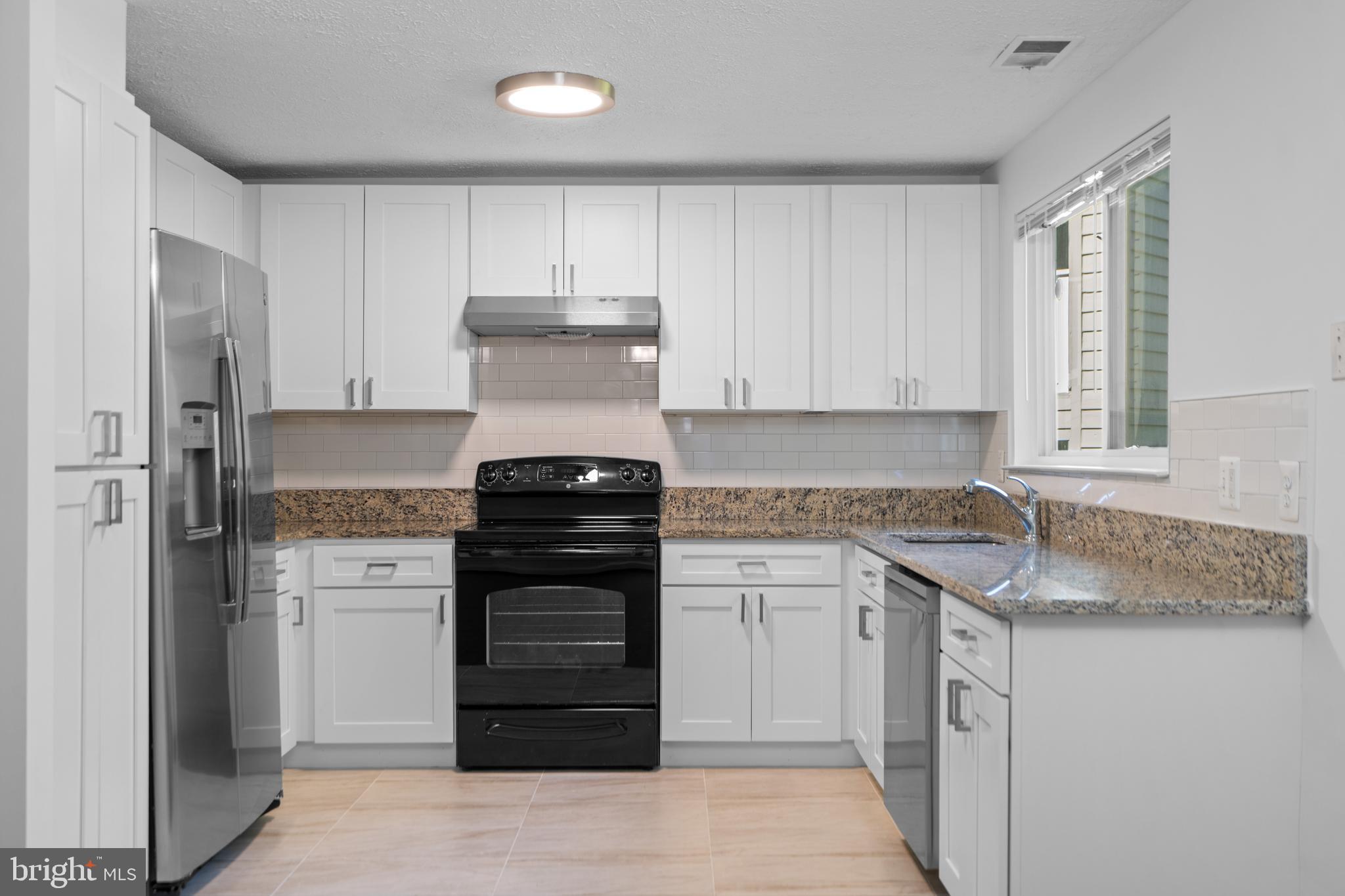 11733 Summerchase Circle, Unit 1733C Reston, VA 20194 - Photo 2 of 33 Fabulous new kitchen.