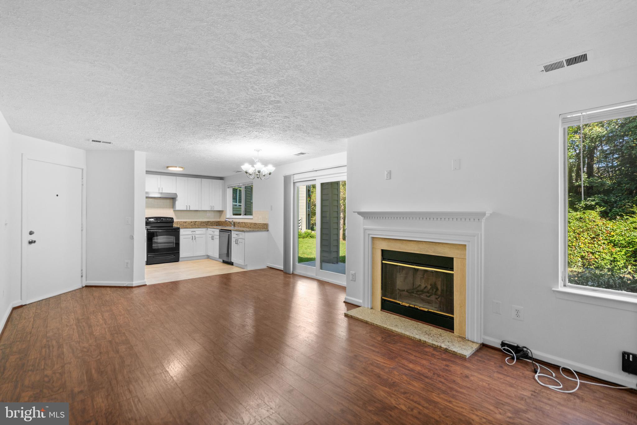 11733 Summerchase Circle, Unit 1733C Reston, VA 20194 - Photo 7 of 33 How about that wood burning fireplace?