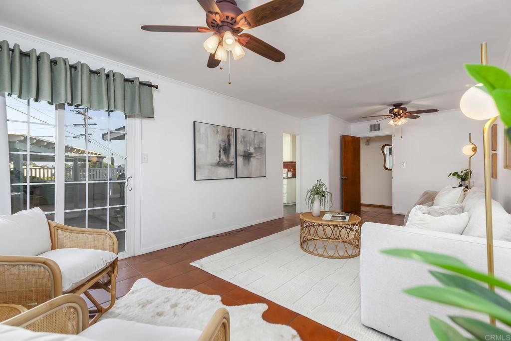 1407 Cascade Place El Cajon, CA 92021 - Photo 14 of 43 a bedroom with furniture and a large window
