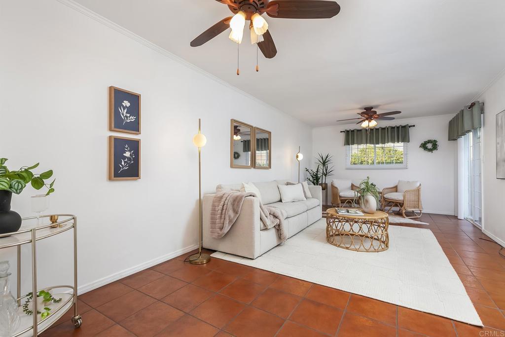 1407 Cascade Place El Cajon, CA 92021 - Photo 15 of 43 a living room with furniture and a chandelier