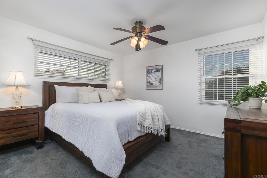 1407 Cascade Place El Cajon, CA 92021 - Photo 18 of 43 a bedroom with a bed and window
