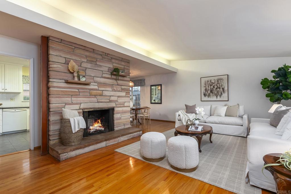1407 Cascade Place El Cajon, CA 92021 - Photo 2 of 43 a living room with furniture and a fireplace