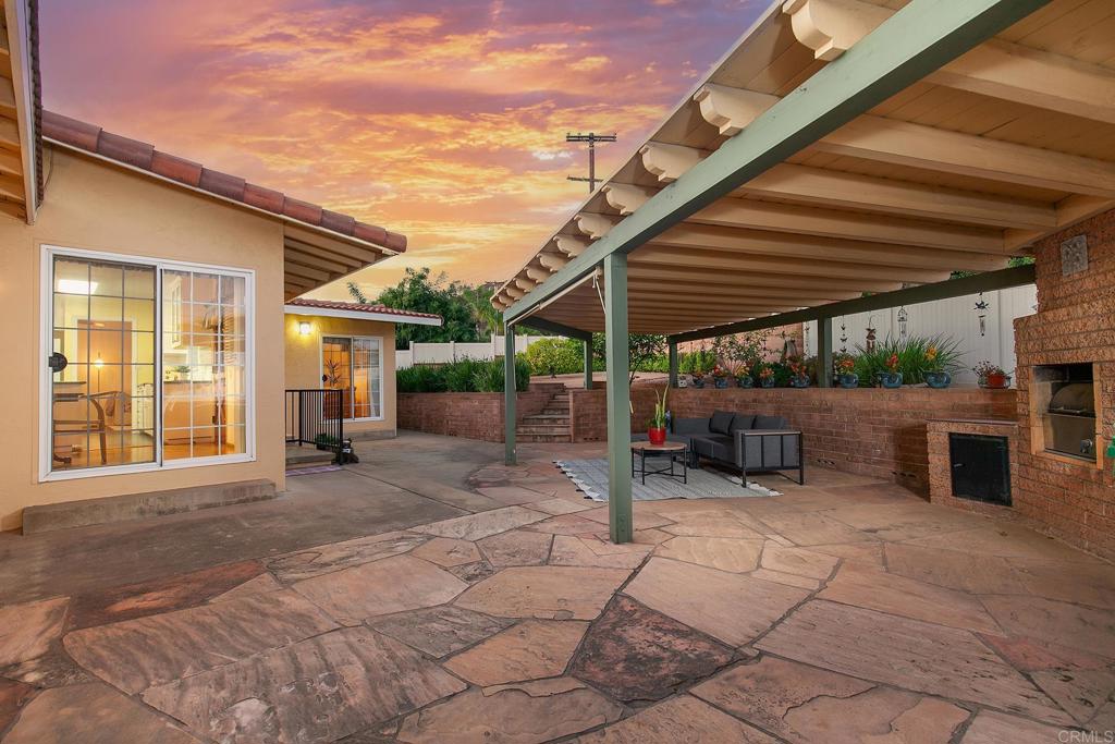 1407 Cascade Place El Cajon, CA 92021 - Photo 25 of 43 a view of a house with backyard porch and sitting area