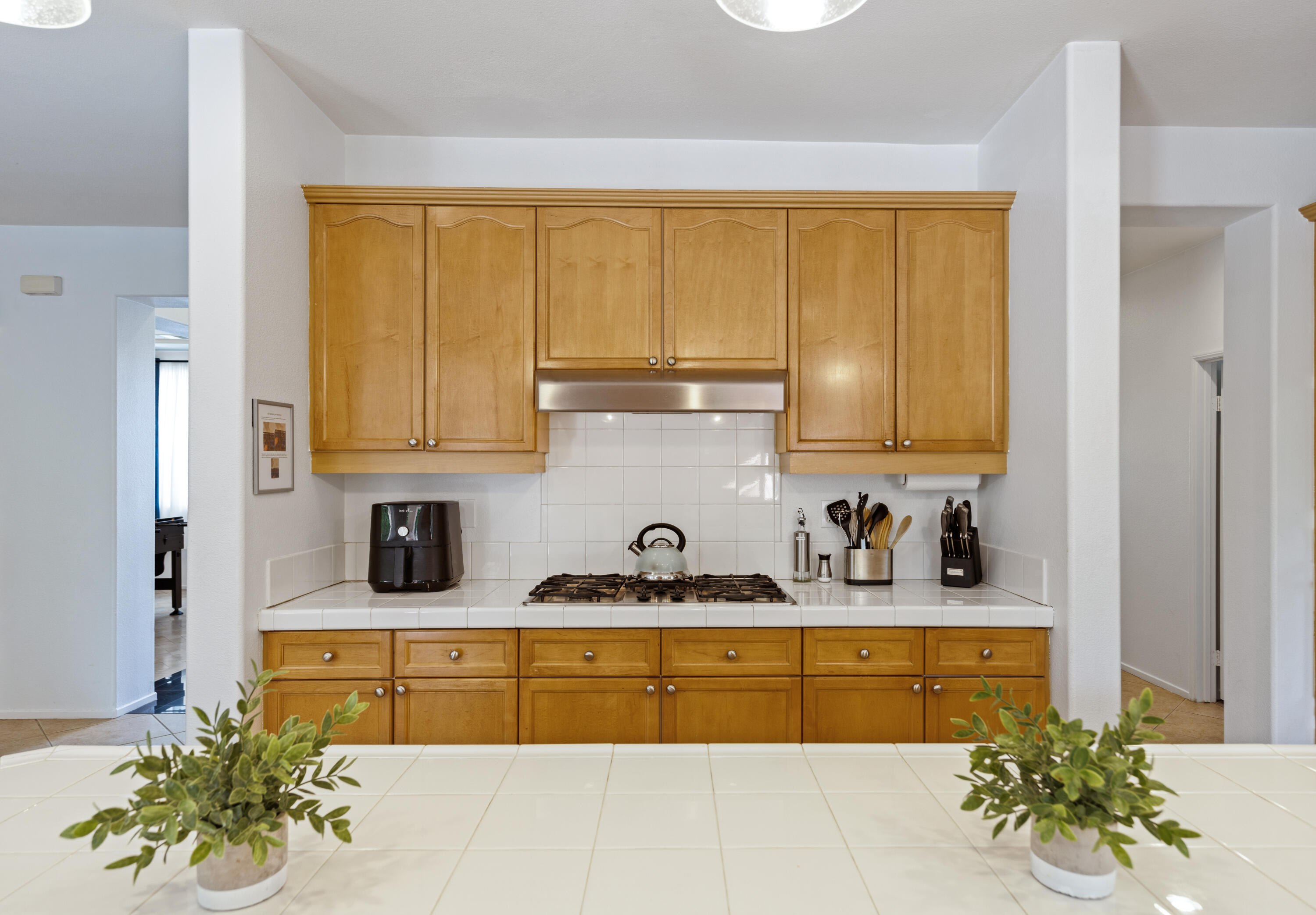83299 Stagecoach Road Indio, CA 92203 - Photo 14 of 44 a kitchen with stainless steel appliances granite countertop a sink and cabinets