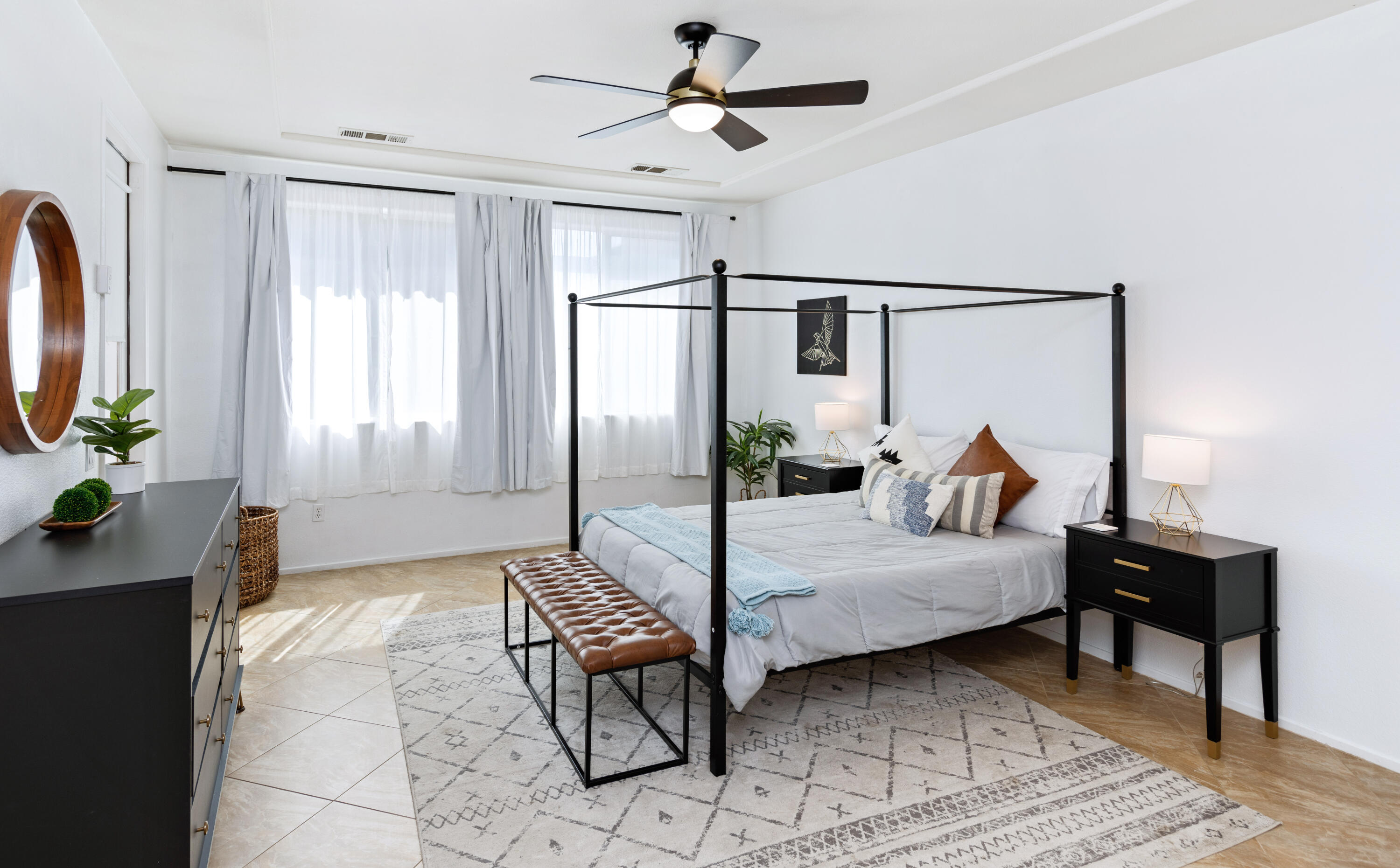 83299 Stagecoach Road Indio, CA 92203 - Photo 17 of 44 a bedroom with furniture and a window