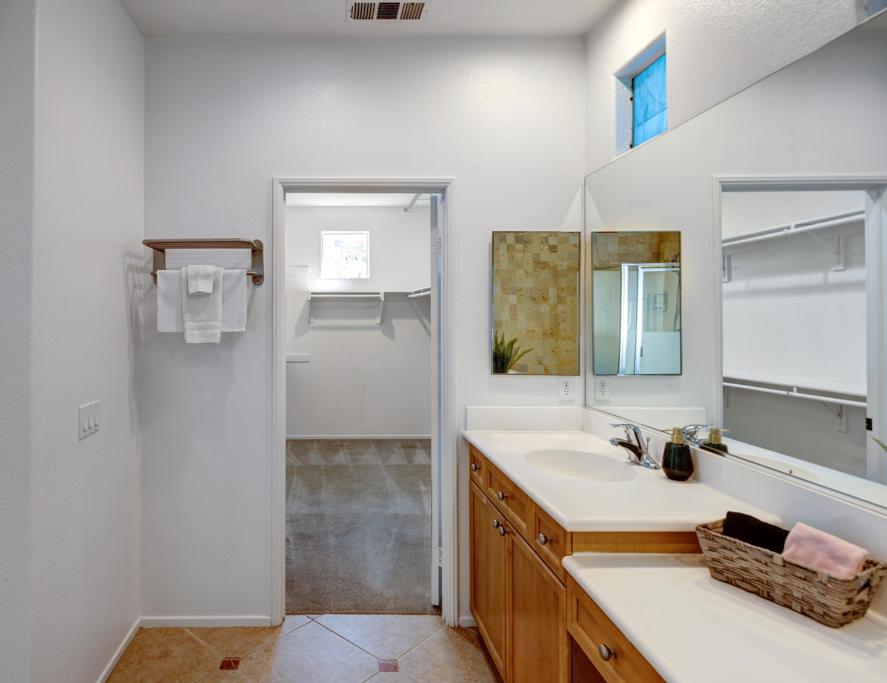 83299 Stagecoach Road Indio, CA 92203 - Photo 21 of 44 a bathroom with a sink and a mirror