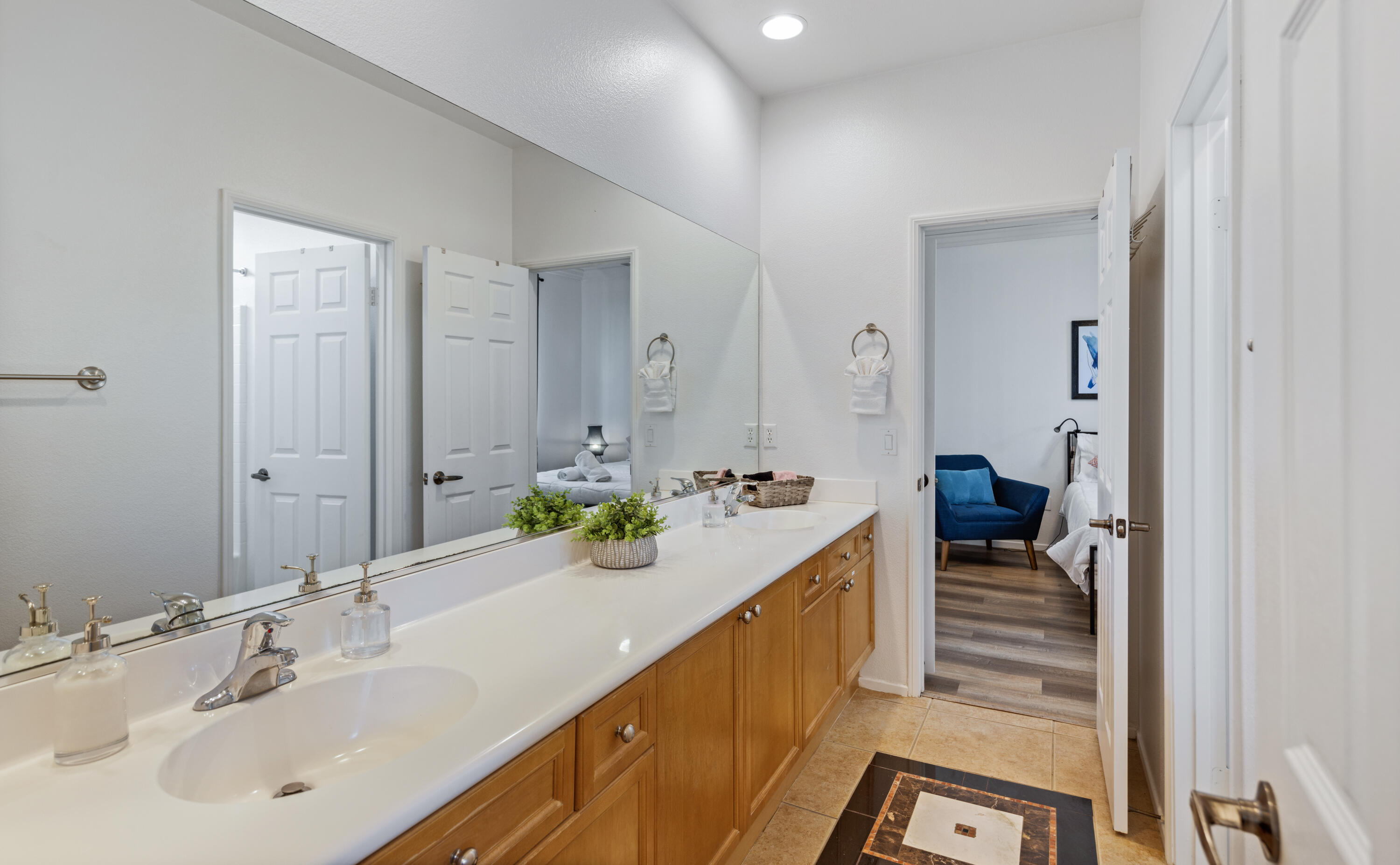 83299 Stagecoach Road Indio, CA 92203 - Photo 24 of 44 a en suite bathroom with a sink and a mirror