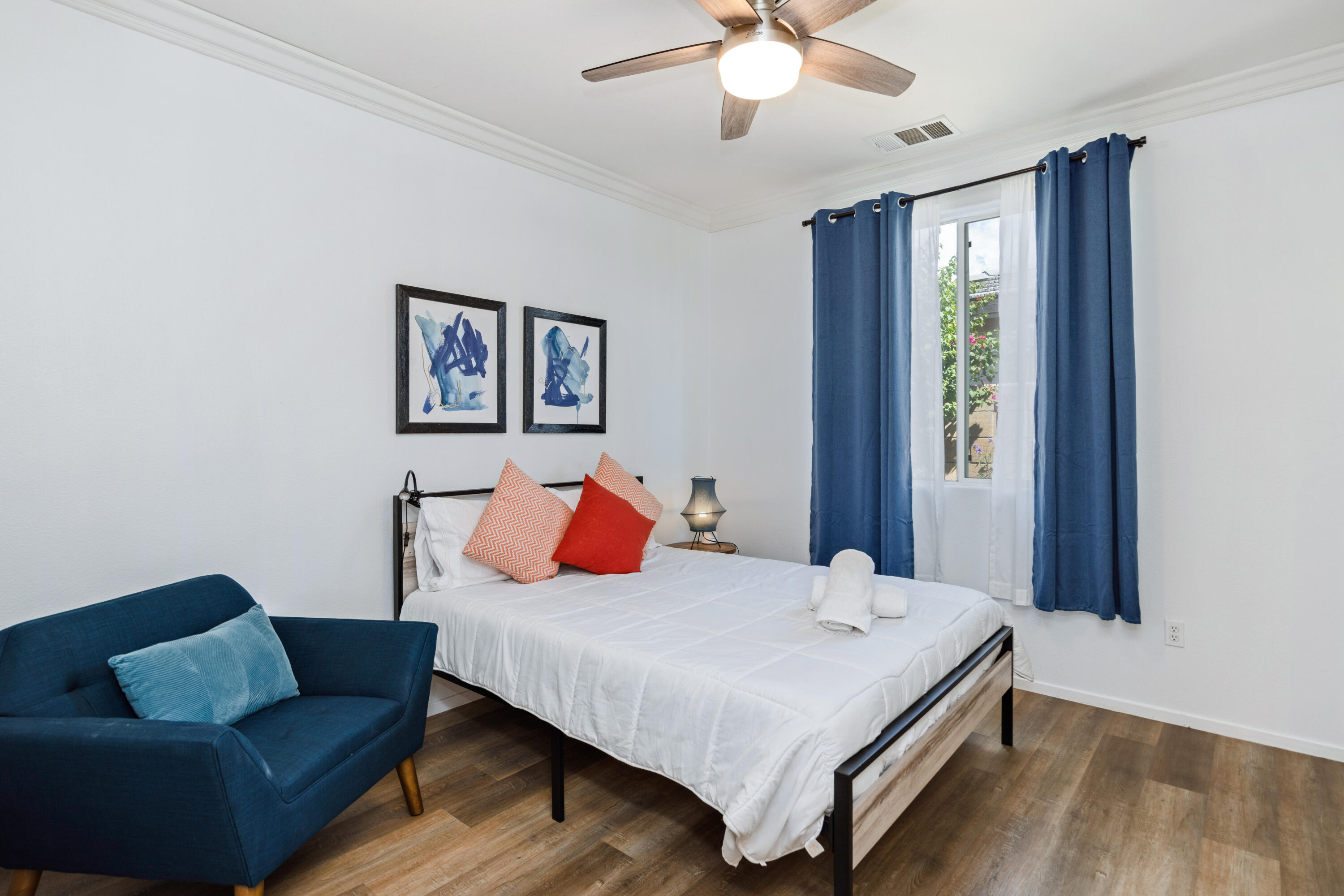 83299 Stagecoach Road Indio, CA 92203 - Photo 25 of 44 a bedroom with a bed and a couch