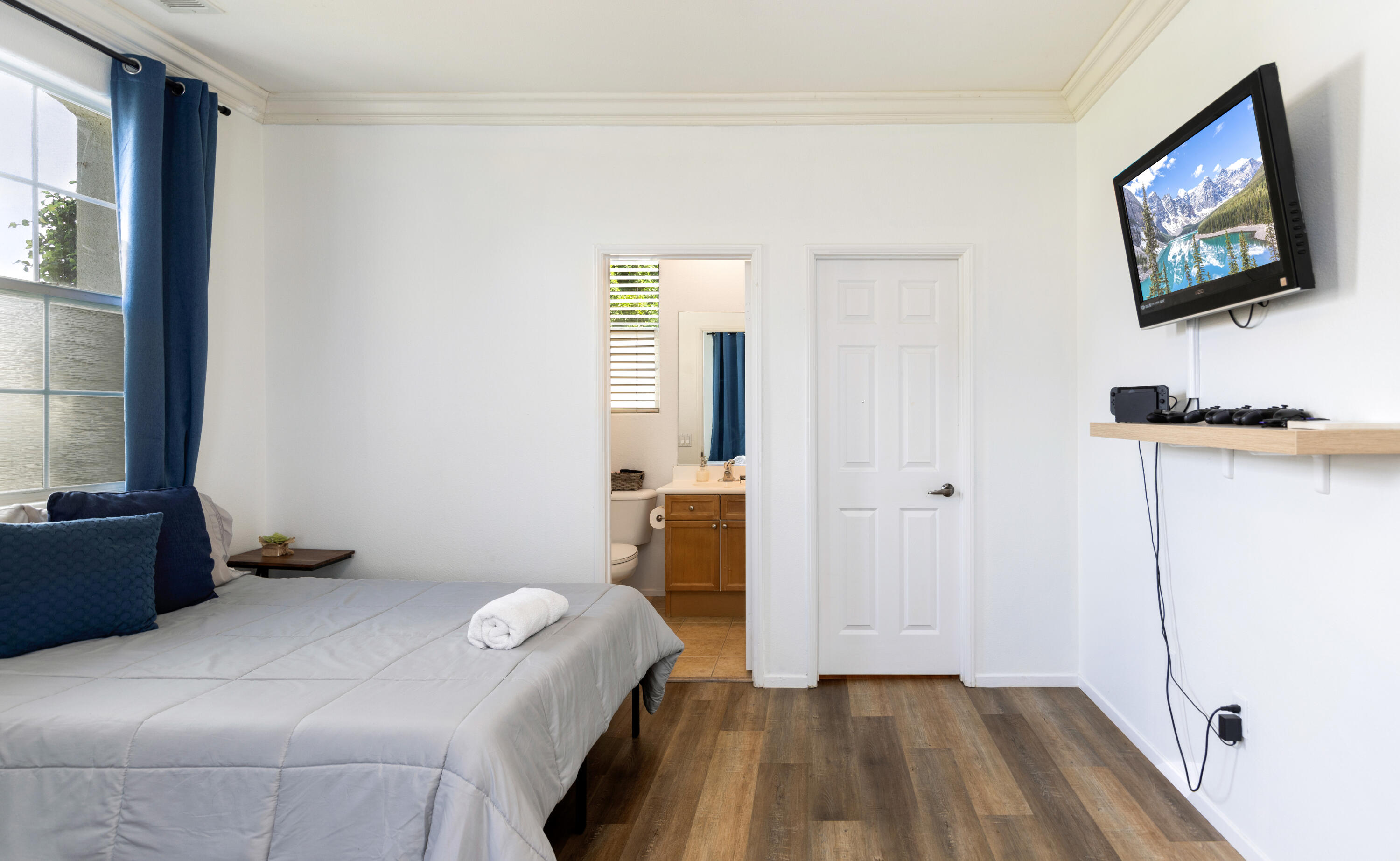 83299 Stagecoach Road Indio, CA 92203 - Photo 28 of 44 a bedroom with a bed and a flat screen tv