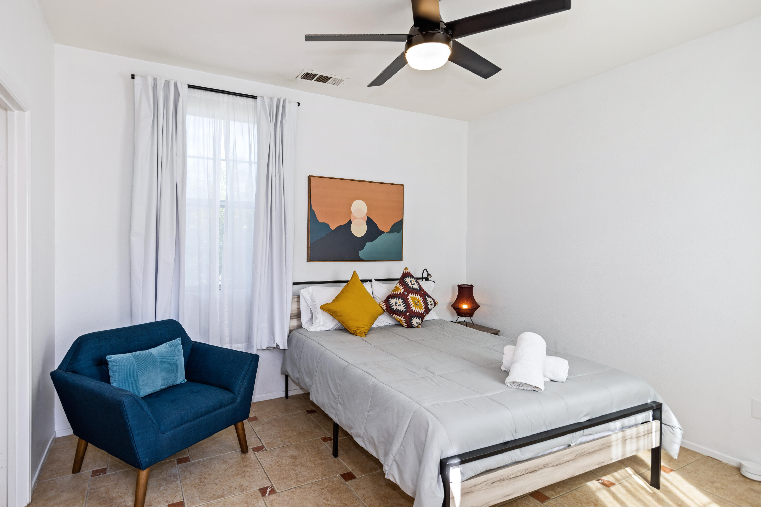 83299 Stagecoach Road Indio, CA 92203 - Photo 33 of 44 a living room with furniture and a window