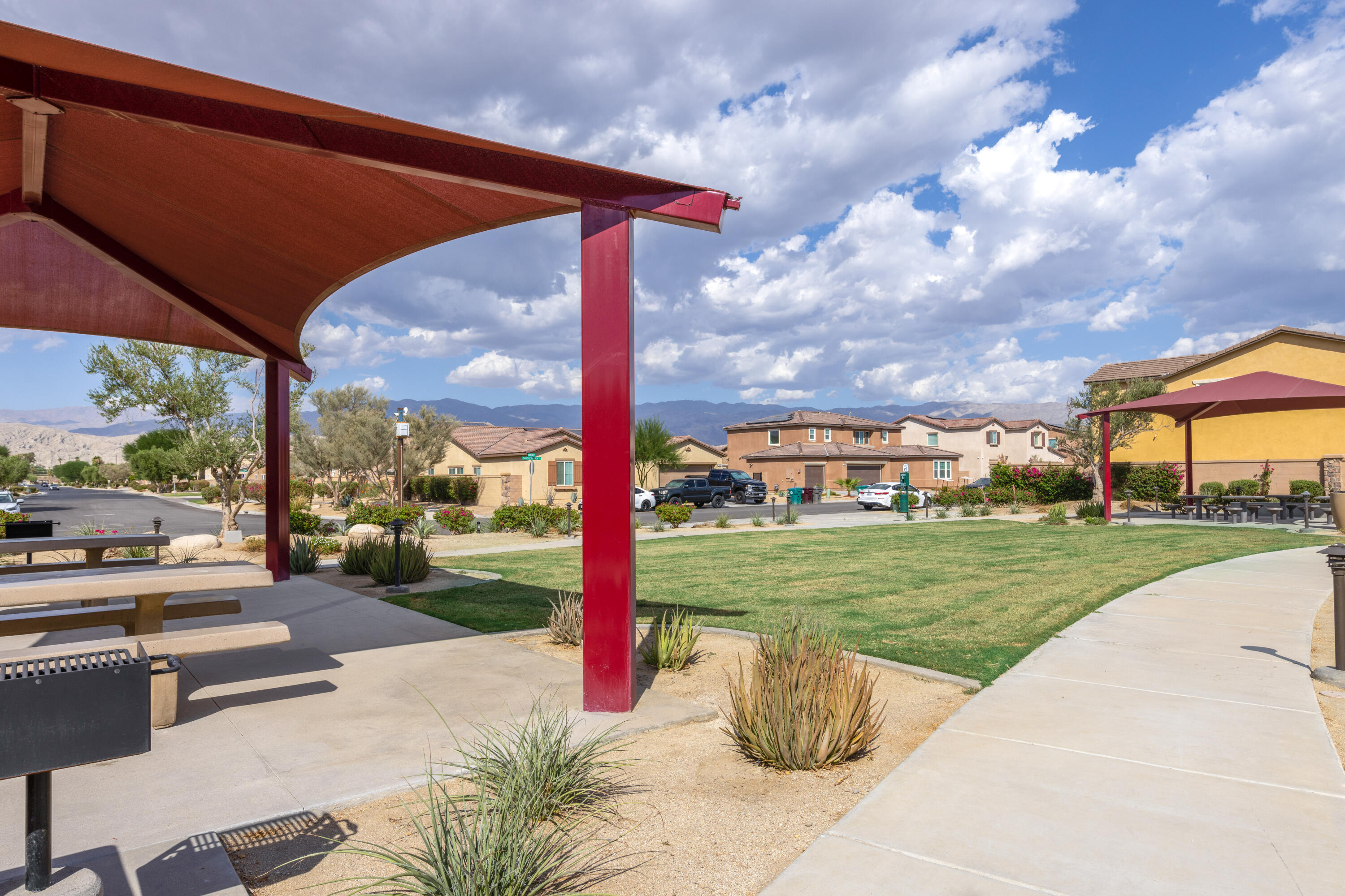 83299 Stagecoach Road Indio, CA 92203 - Photo 43 of 44 a view of a porch with a table and chairs