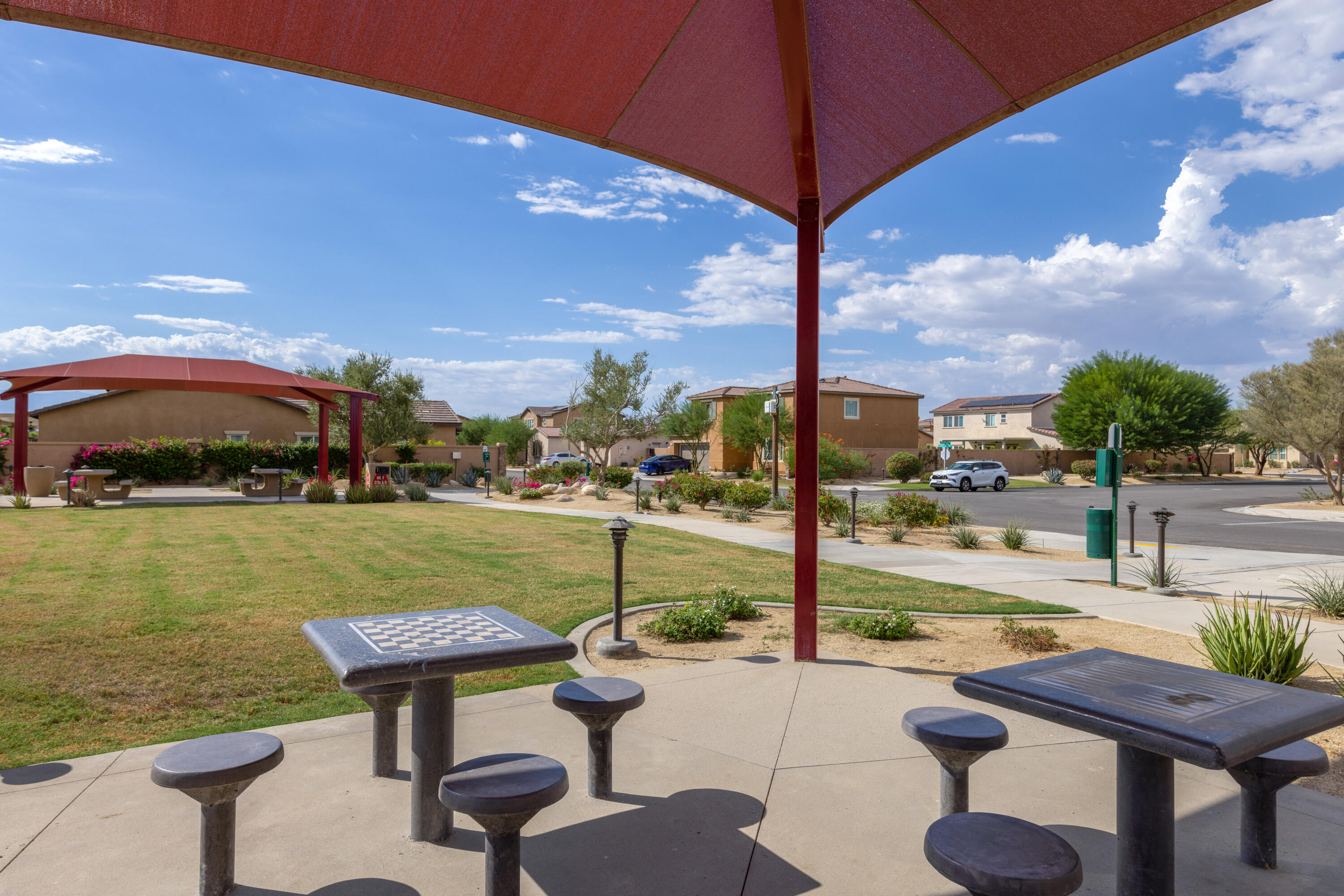 83299 Stagecoach Road Indio, CA 92203 - Photo 44 of 44 a view of a lake with couches and wooden floor