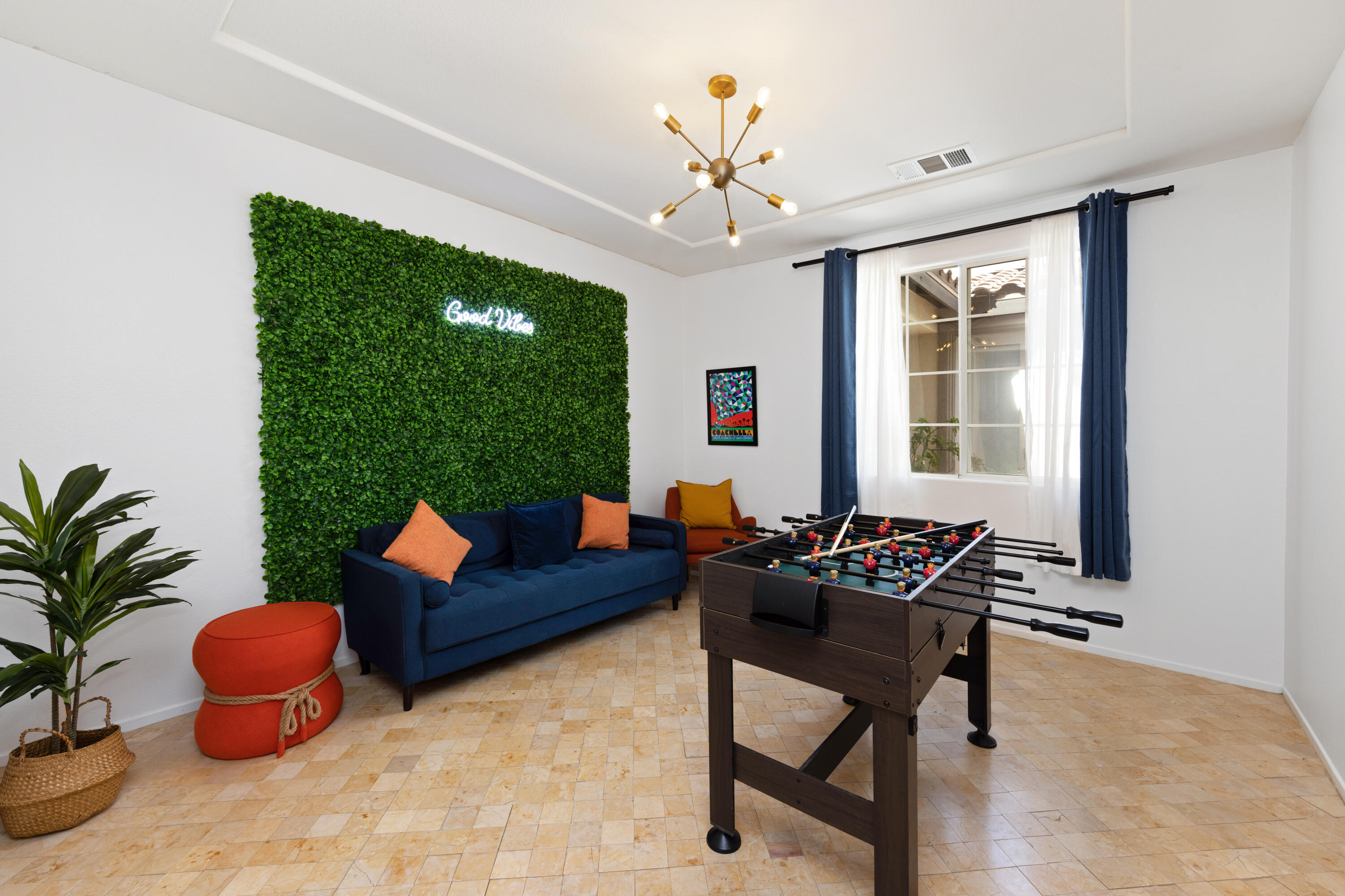 83299 Stagecoach Road Indio, CA 92203 - Photo 6 of 44 a living room with furniture and a potted plant