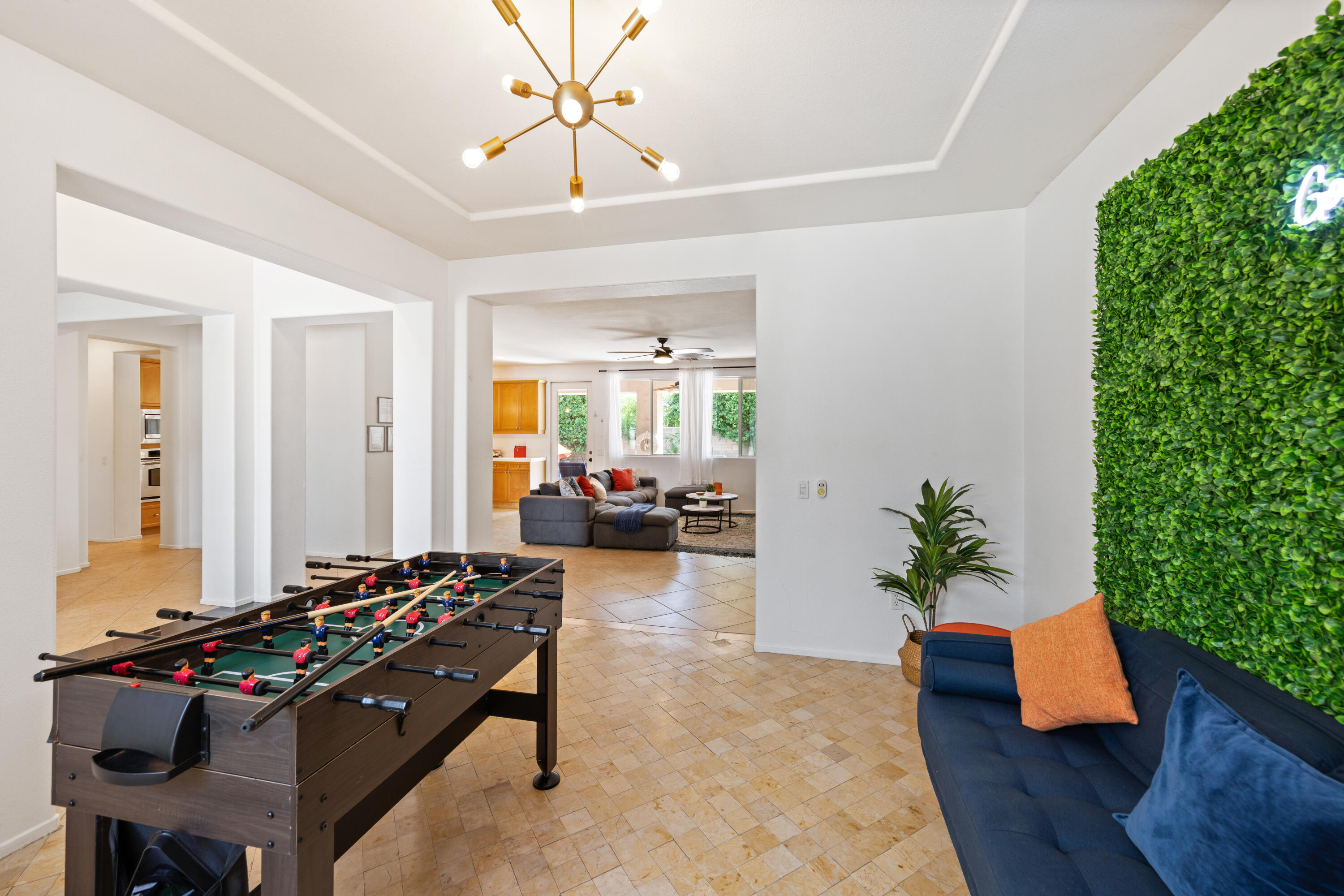 83299 Stagecoach Road Indio, CA 92203 - Photo 7 of 44 a bedroom with furniture and a potted plant