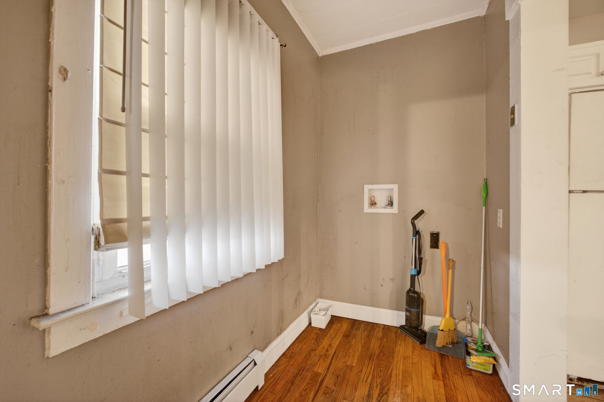 670 Hanover Road Meriden, CT 06451 - Photo 24 of 40 a view of a room with wooden floor and a window