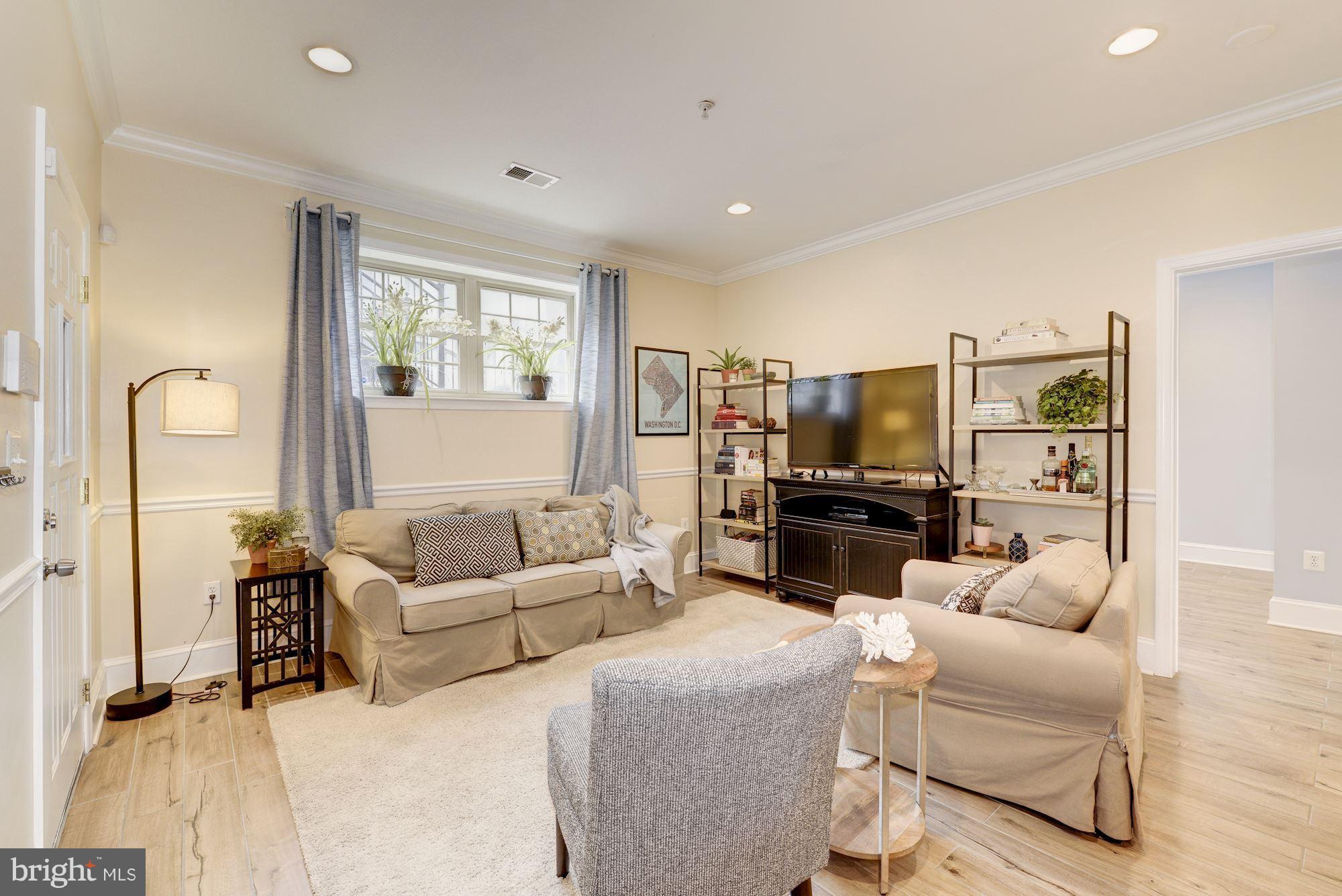 1630 Rosedale Street Northeast, Unit 1 Washington, DC 20002 - Photo 5 of 30 Living Room with high ceilings& crown molding