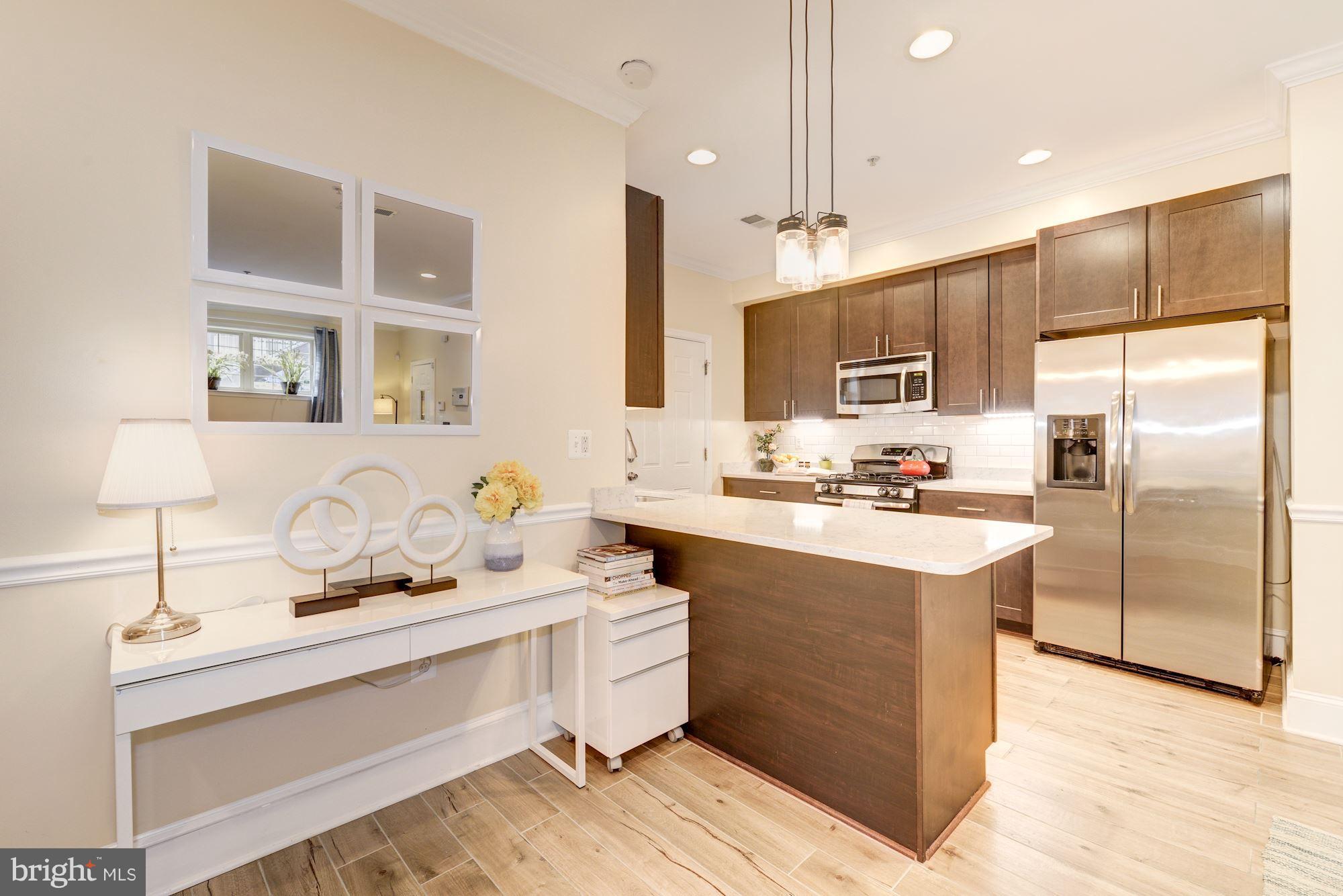 1630 Rosedale Street Northeast, Unit 1 Washington, DC 20002 - Photo 7 of 30 Open plan chef's kitchen