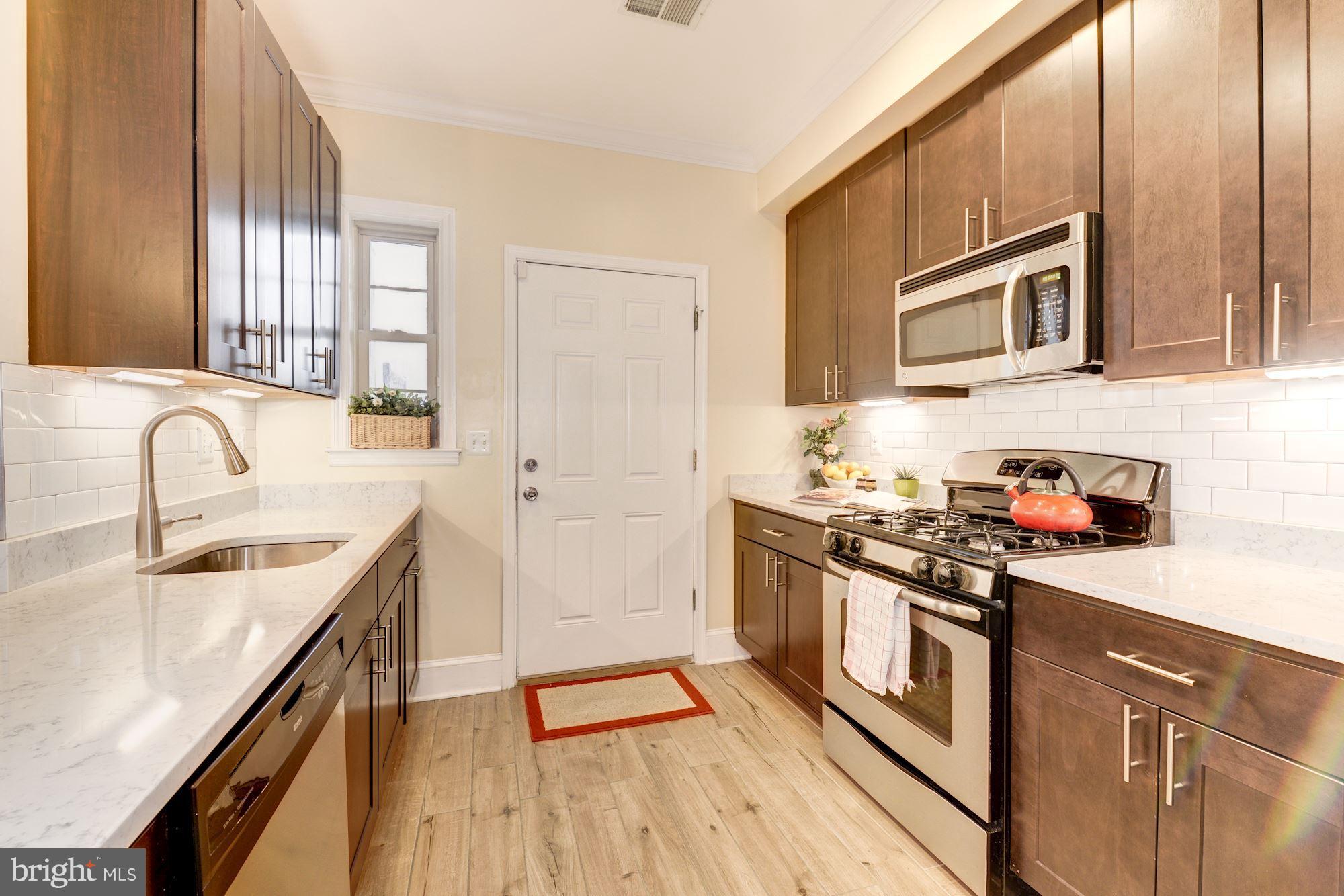 1630 Rosedale Street Northeast, Unit 1 Washington, DC 20002 - Photo 9 of 30 Stainless appliance with gas range