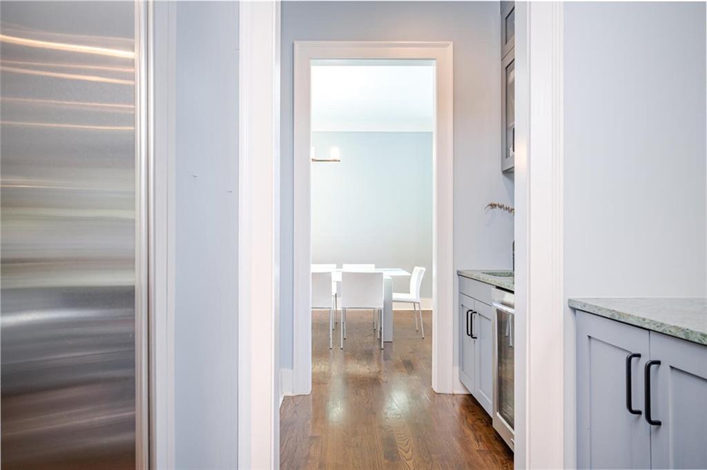123 Ansley Street Decatur, GA 30030 - Photo 15 of 61 a view of a hallway with wooden floor