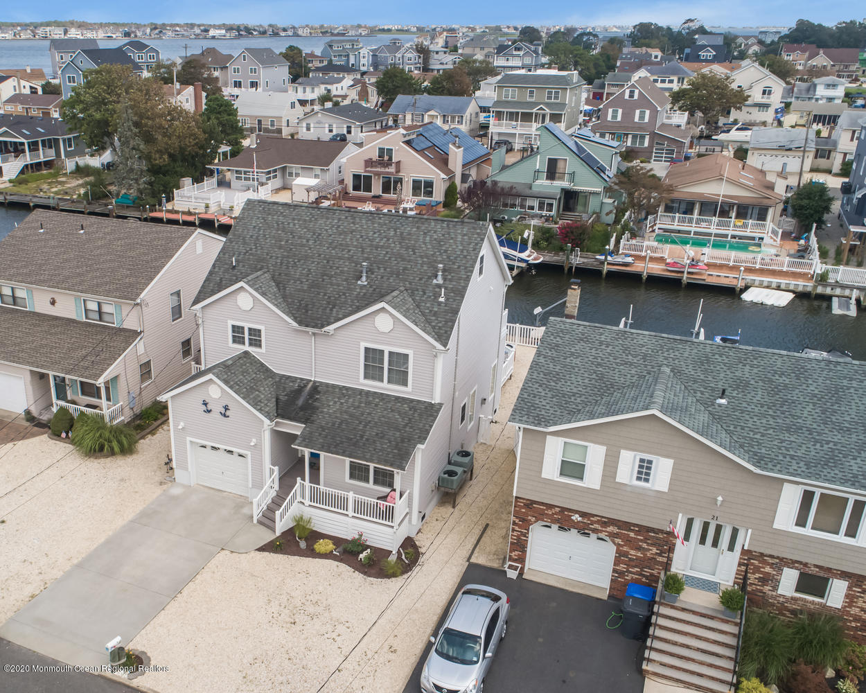 23 Pilot Road Toms River, NJ 08753 - Photo 46 of 62 an aerial view of a residential apartment building with a yard
