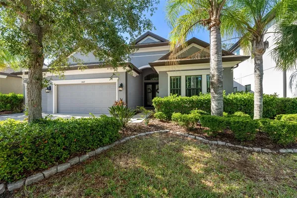 front view of a house with a yard
