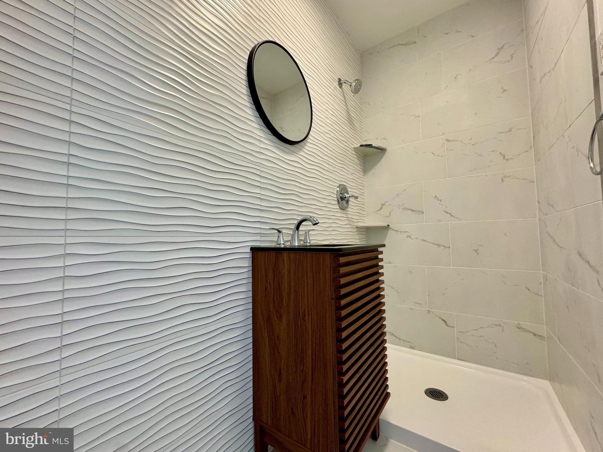 3 Mint Leaf Drive Hamilton, NJ 08690 - Photo 17 of 33 a bathroom with a sink and a mirror