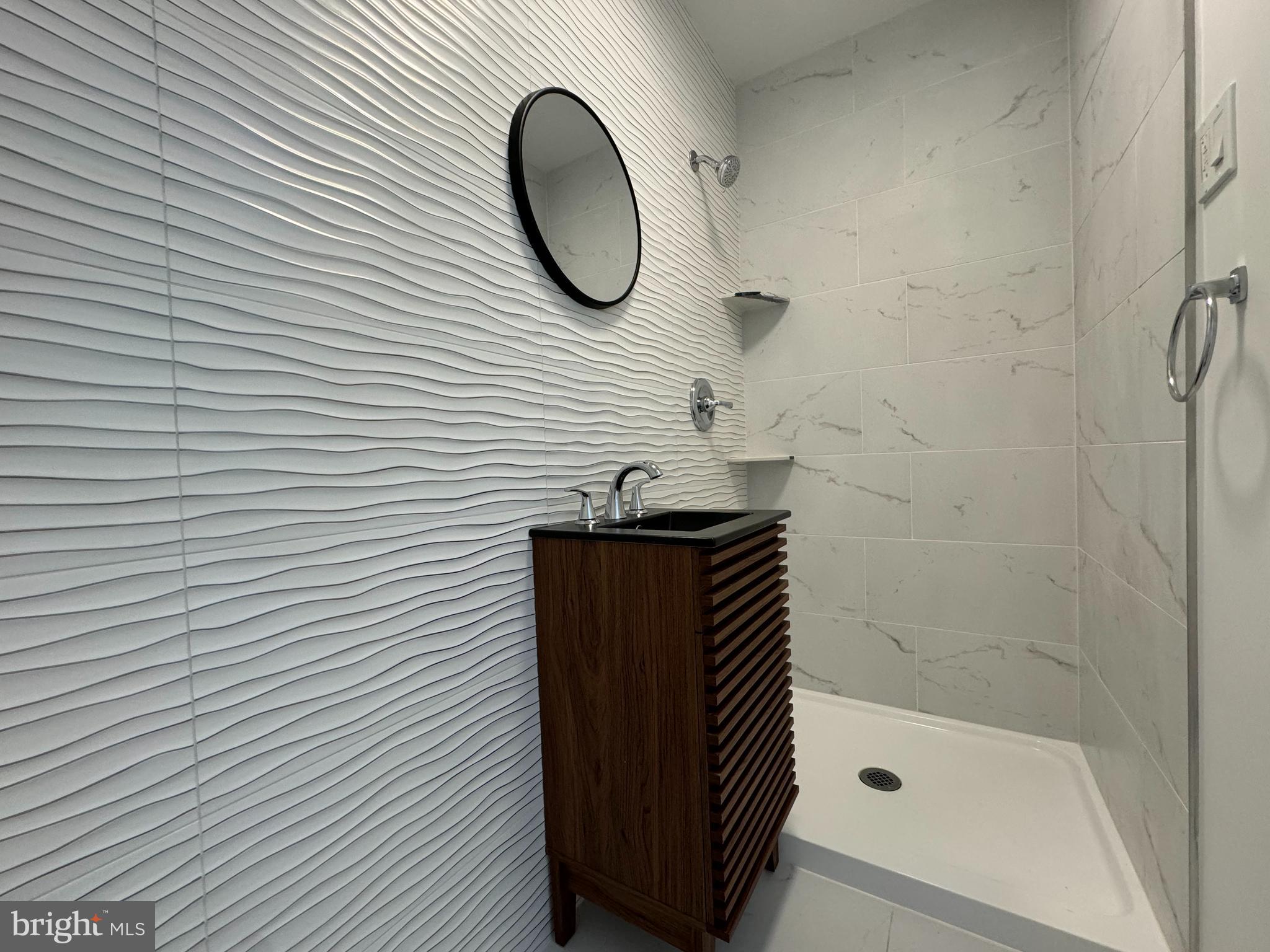 3 Mint Leaf Drive Hamilton, NJ 08690 - Photo 18 of 33 a bathroom with a sink and a mirror