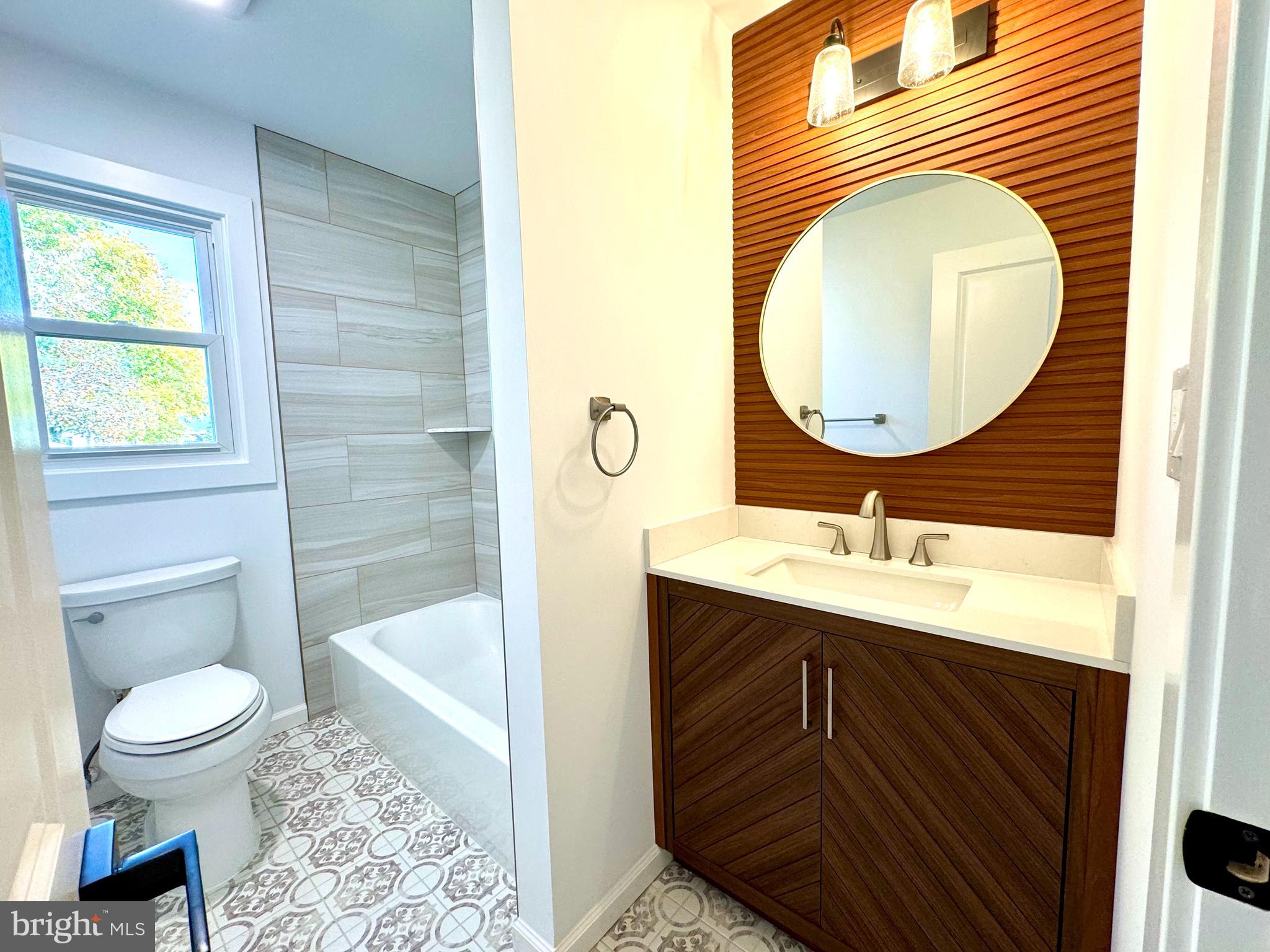 3 Mint Leaf Drive Hamilton, NJ 08690 - Photo 22 of 33 a bathroom with a toilet a sink and a mirror