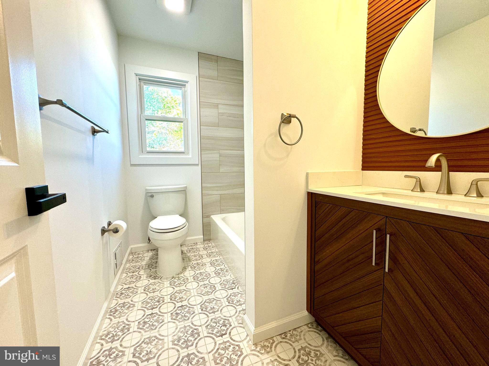 3 Mint Leaf Drive Hamilton, NJ 08690 - Photo 23 of 33 a bathroom with a sink and a mirror