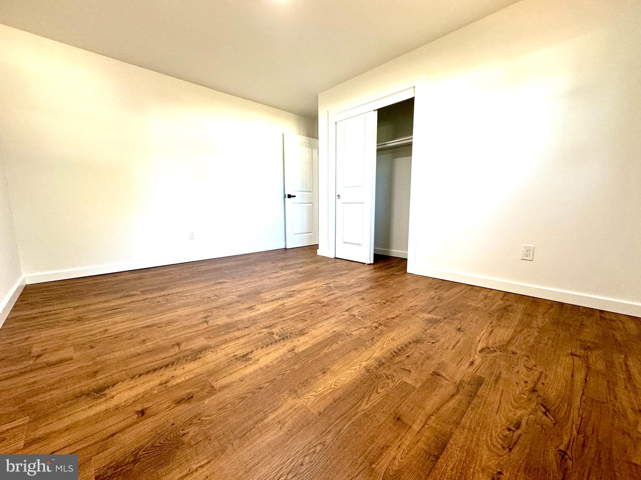 3 Mint Leaf Drive Hamilton, NJ 08690 - Photo 26 of 33 an empty room with wooden floor and closet