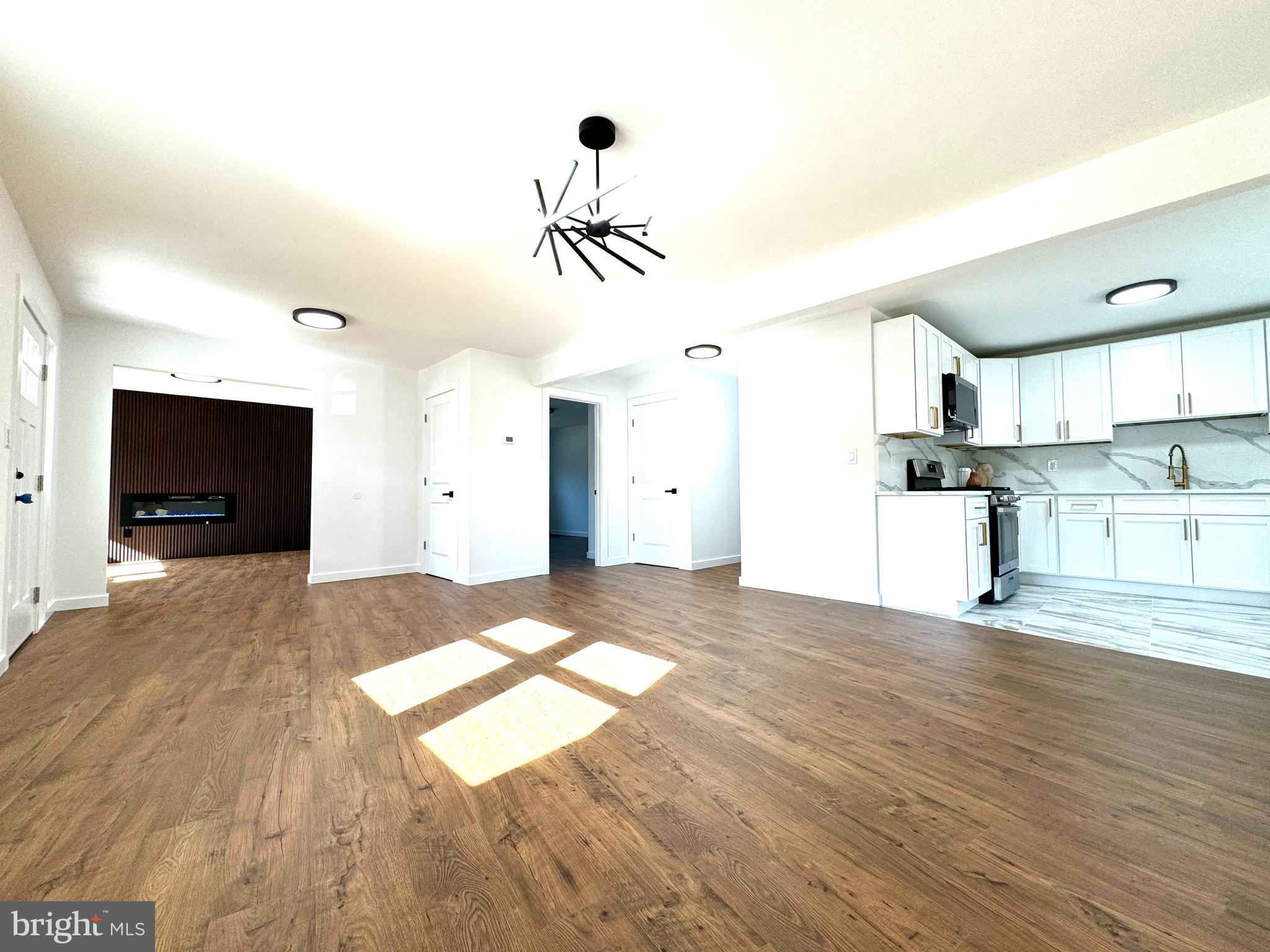 3 Mint Leaf Drive Hamilton, NJ 08690 - Photo 3 of 33 a view of a kitchen with a sink and a window