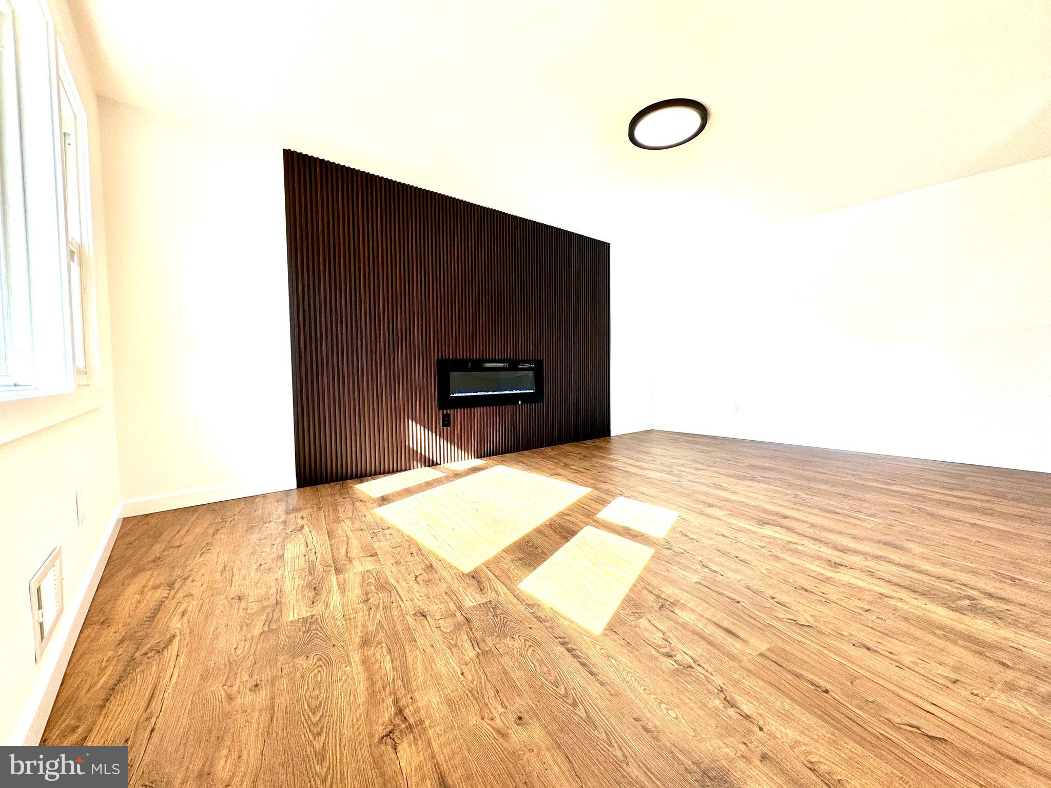 3 Mint Leaf Drive Hamilton, NJ 08690 - Photo 4 of 33 a view of empty room with wooden floor