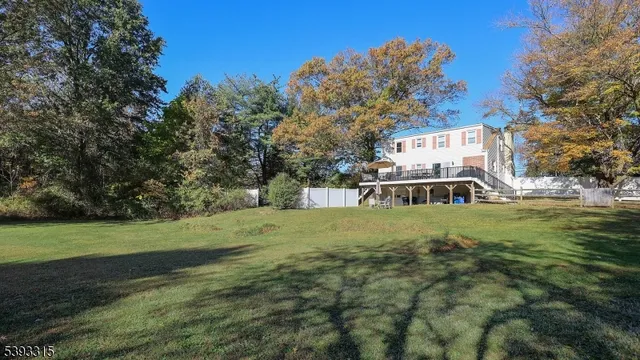 a white toilet sitting next to a bathroom sink and tub