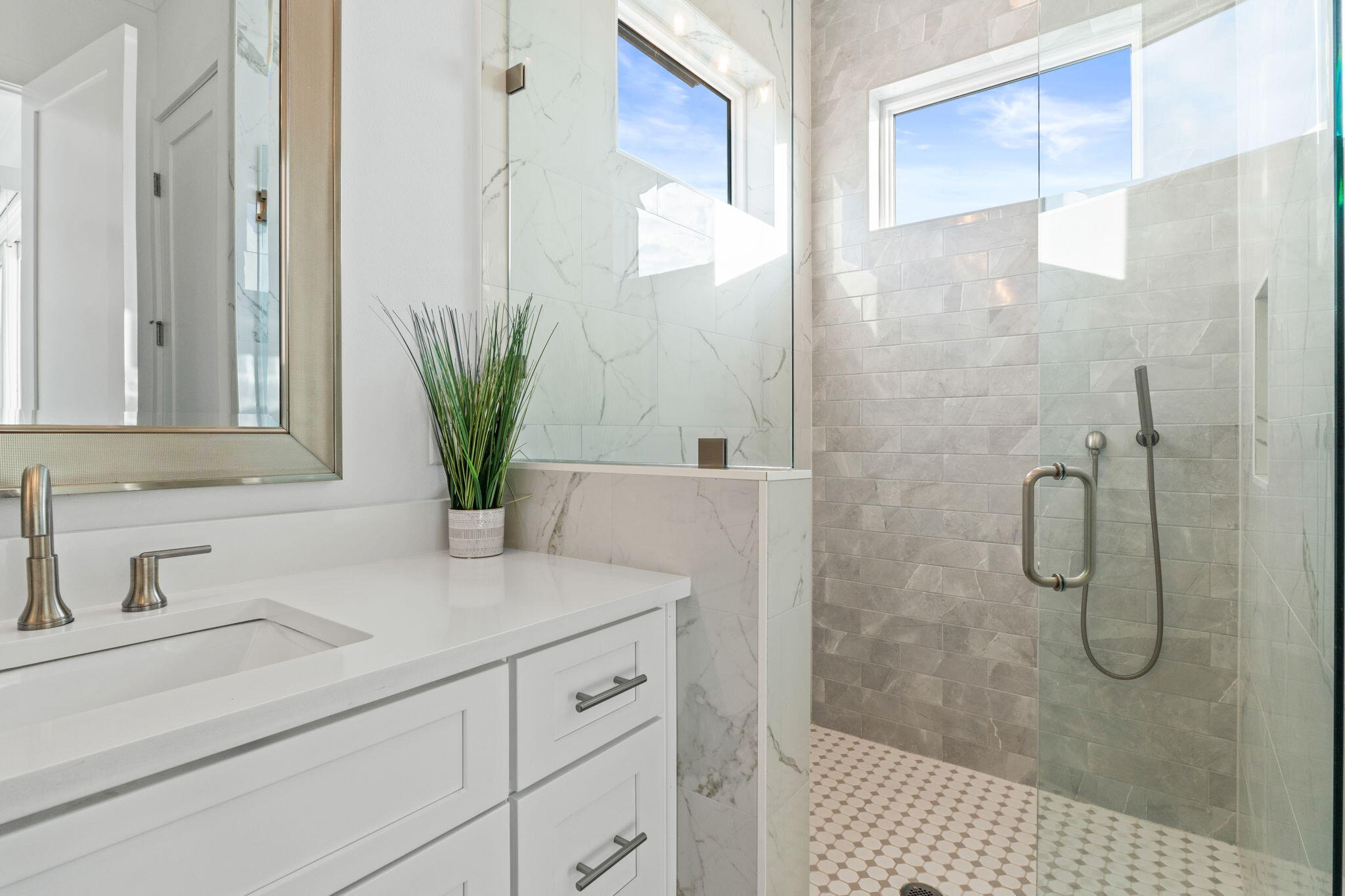 17 Penny Lane Santa Rosa Beach, FL 32459 - Photo 39 of 91 a bathroom with a shower sink and mirror