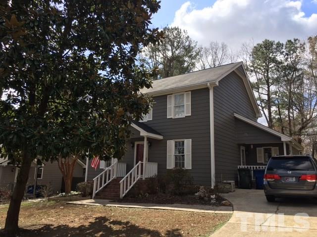 7329 Mill Ridge Road Raleigh, NC 27613 - Photo 25 of 25 a front view of a house with a yard