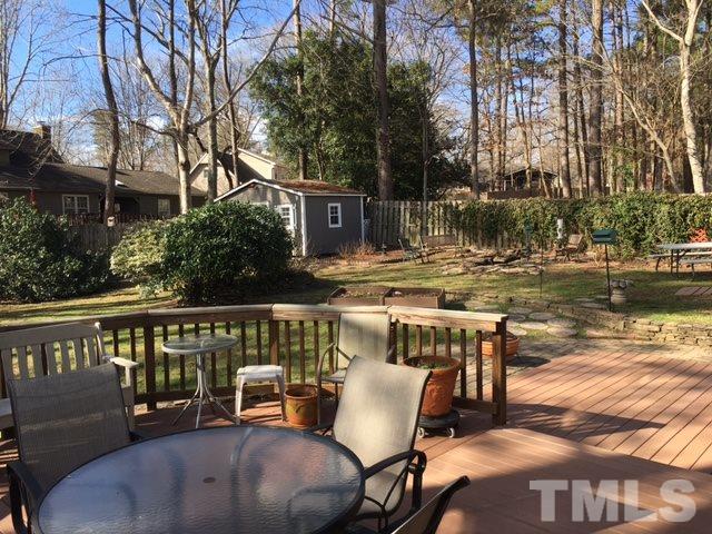 7329 Mill Ridge Road Raleigh, NC 27613 - Photo 5 of 25 a roof deck view with table and chairs