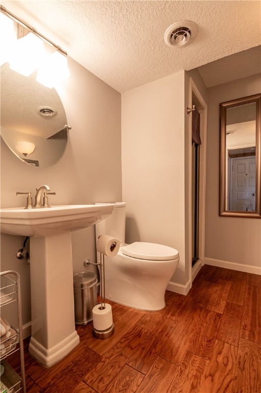 75 Ridgedale Drive Decatur, IL 62521 - Photo 19 of 26 a bathroom with a toilet a sink and mirror