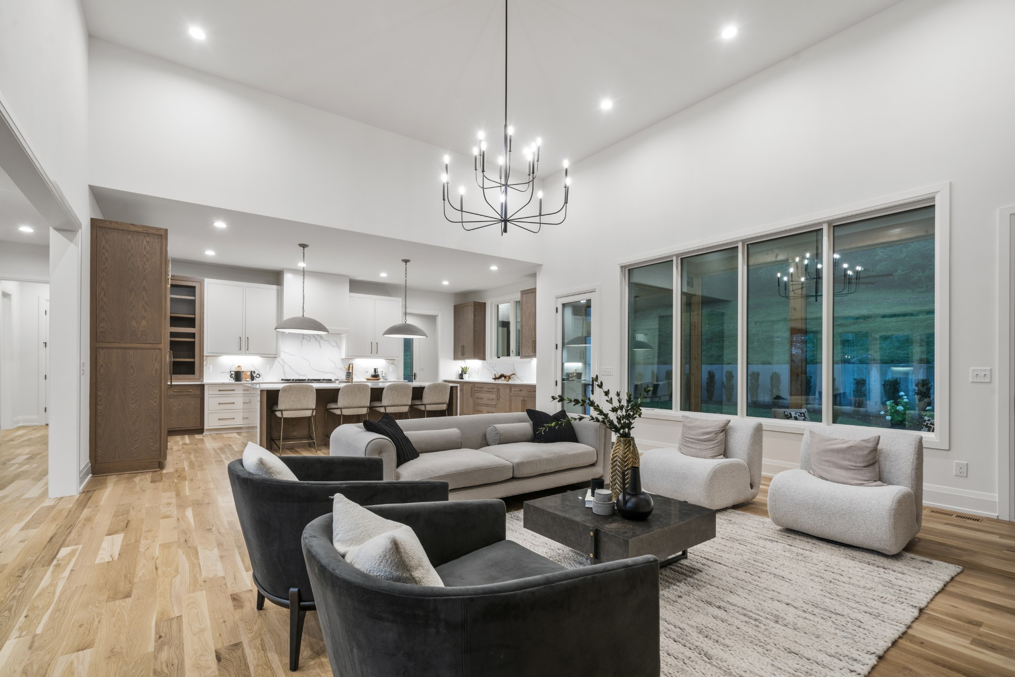 1323 Harding Place Nashville, TN 37215 - Photo 2 of 41 a living room with furniture dining table and a chandelier