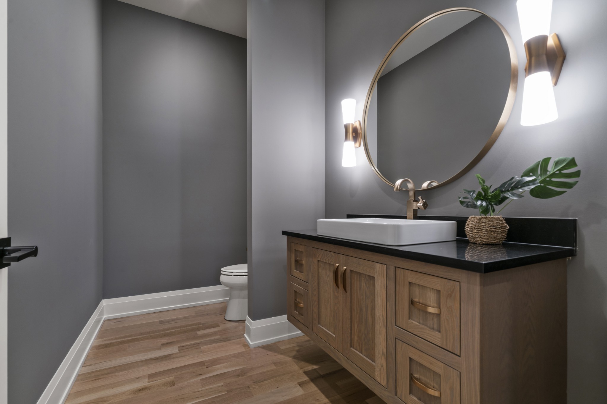 1323 Harding Place Nashville, TN 37215 - Photo 24 of 41 a bathroom with a granite countertop sink a toilet and a mirror