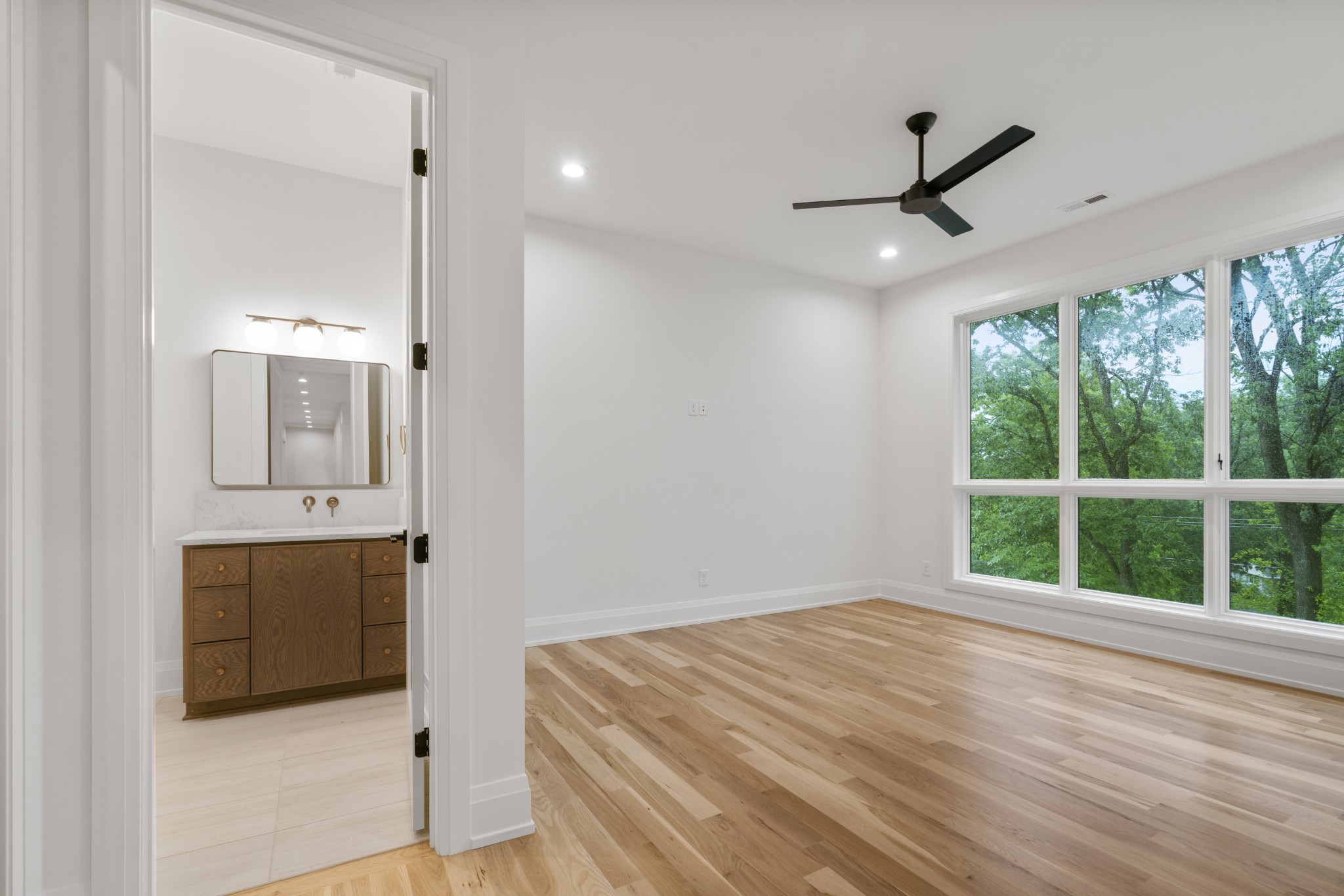 1323 Harding Place Nashville, TN 37215 - Photo 27 of 41 a view of an empty room with a window and a kitchen view