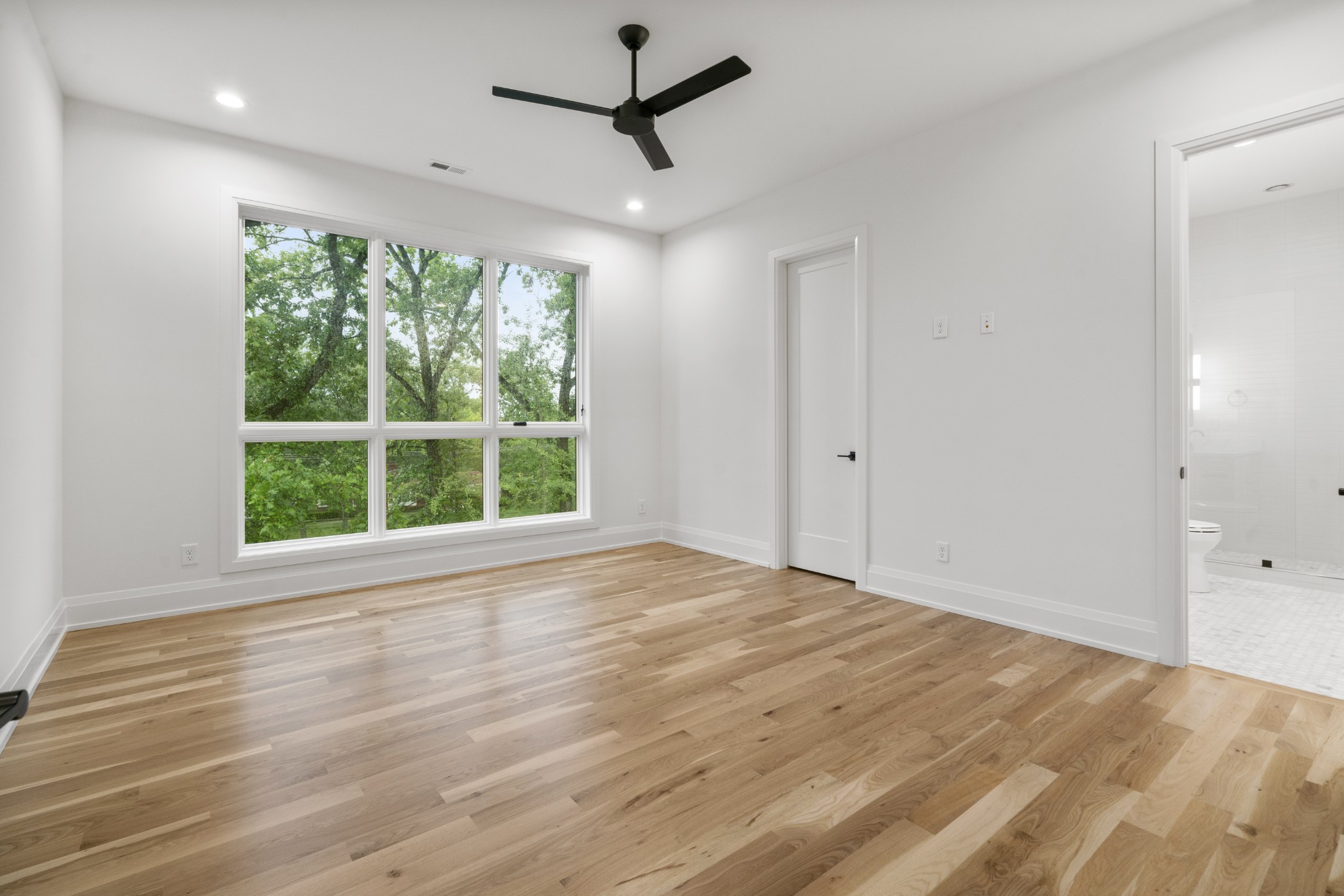 1323 Harding Place Nashville, TN 37215 - Photo 31 of 41 a view of empty room with wooden floor and fan