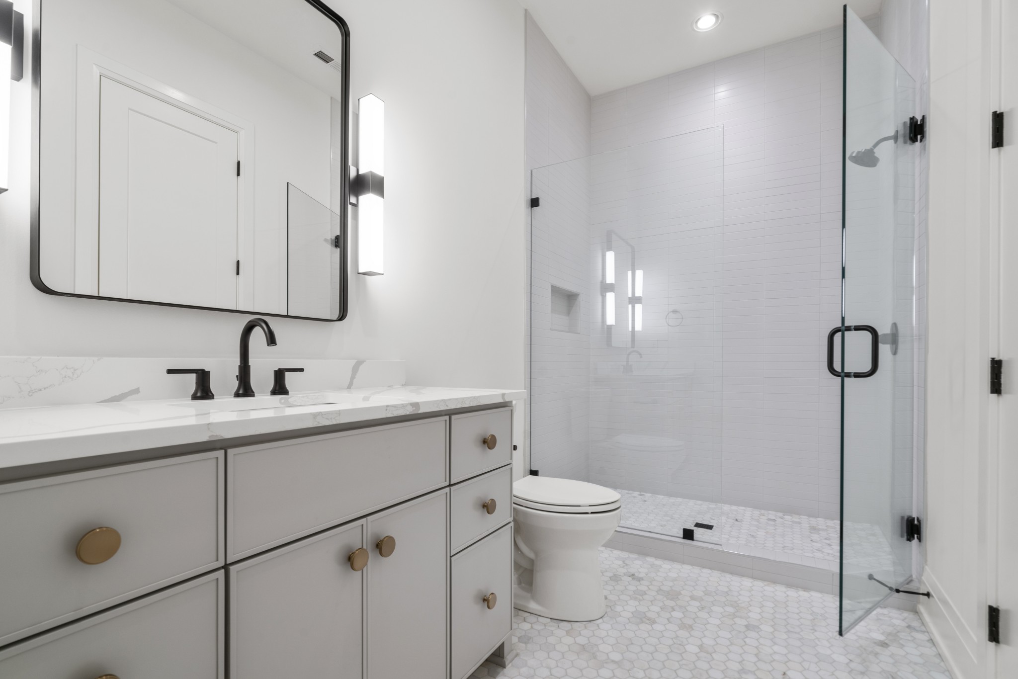 1323 Harding Place Nashville, TN 37215 - Photo 32 of 41 a bathroom with a toilet sink and shower