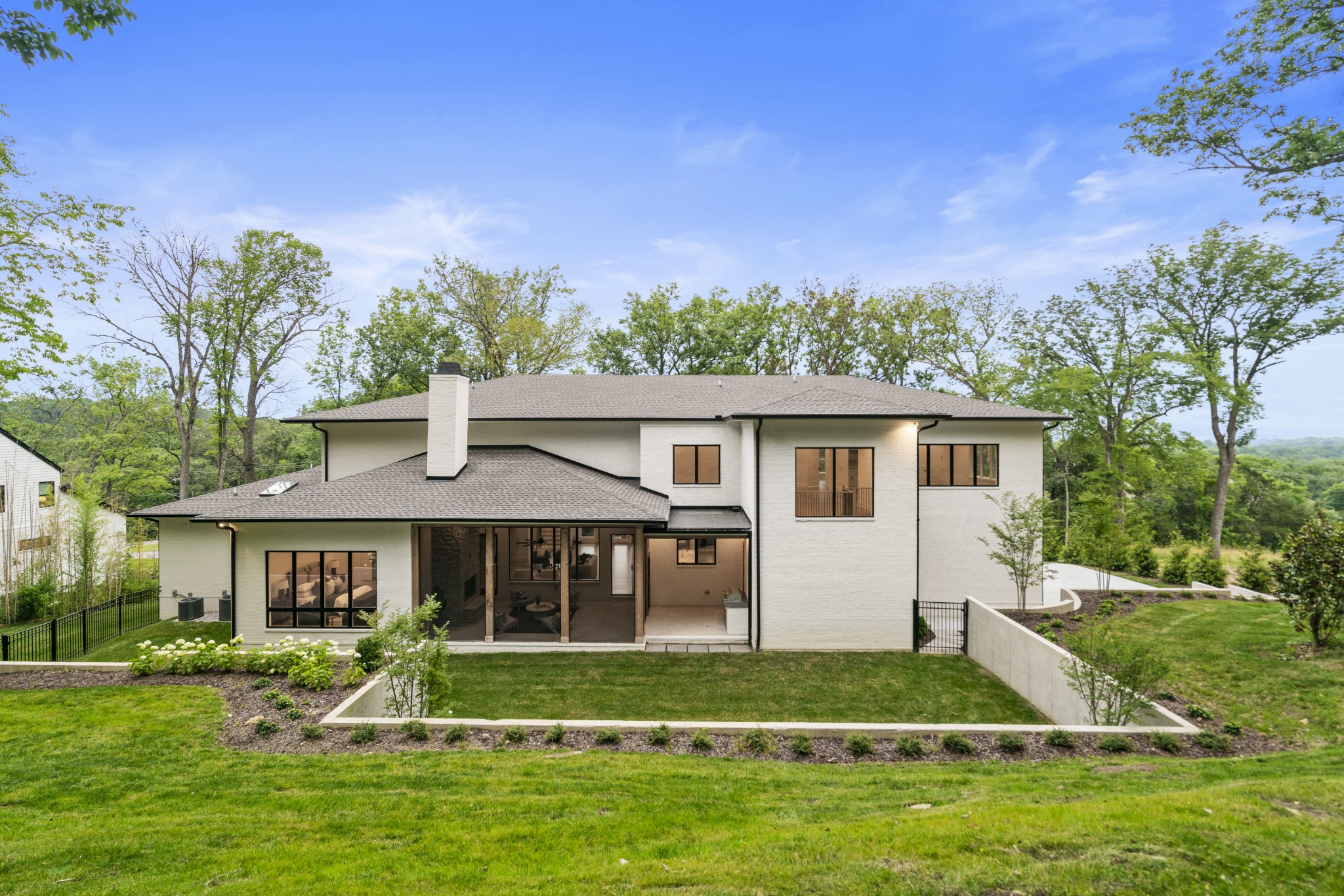 1323 Harding Place Nashville, TN 37215 - Photo 36 of 41 a front view of a house with a yard