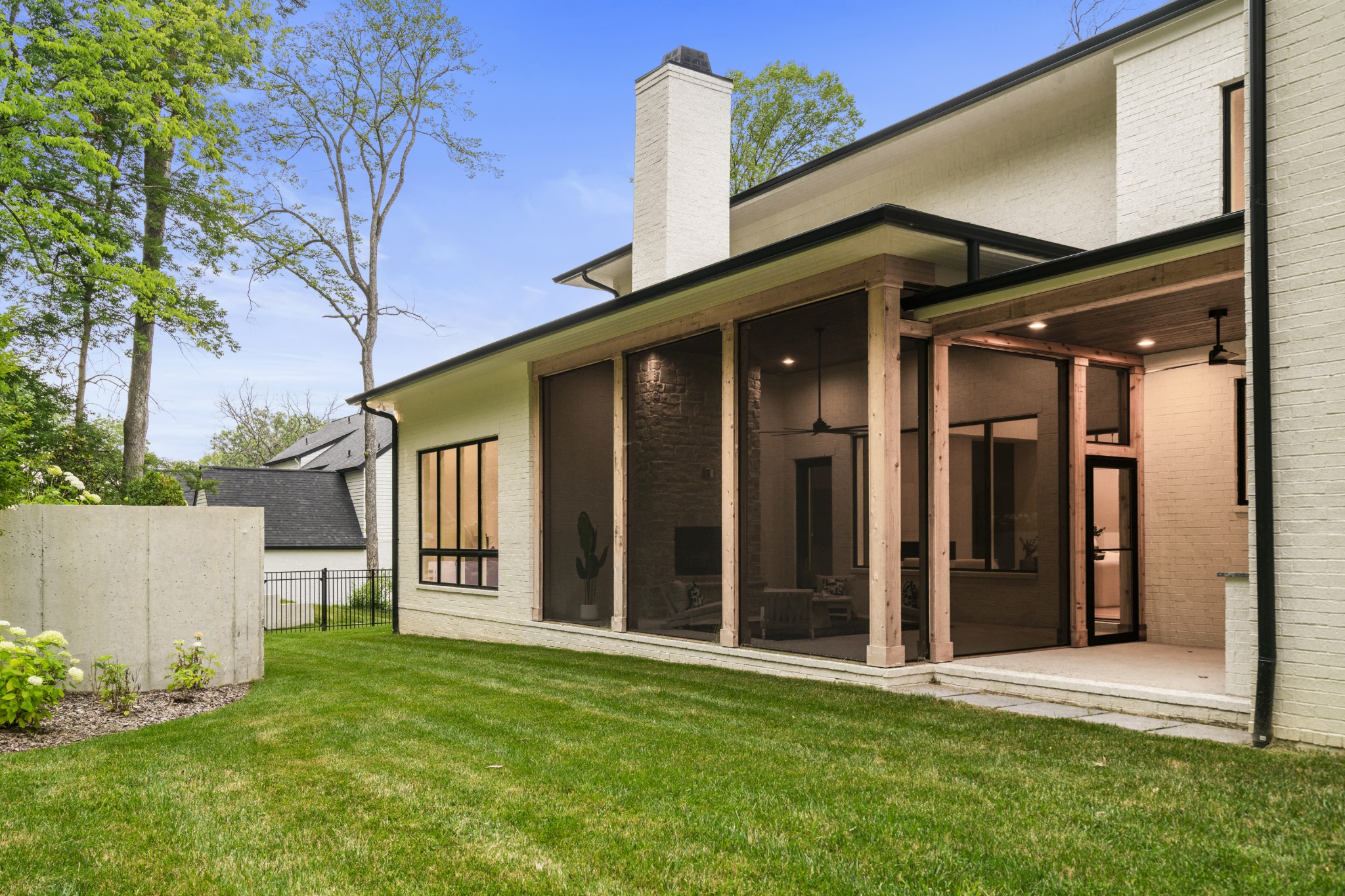 1323 Harding Place Nashville, TN 37215 - Photo 37 of 41 a front view of a house with a garden