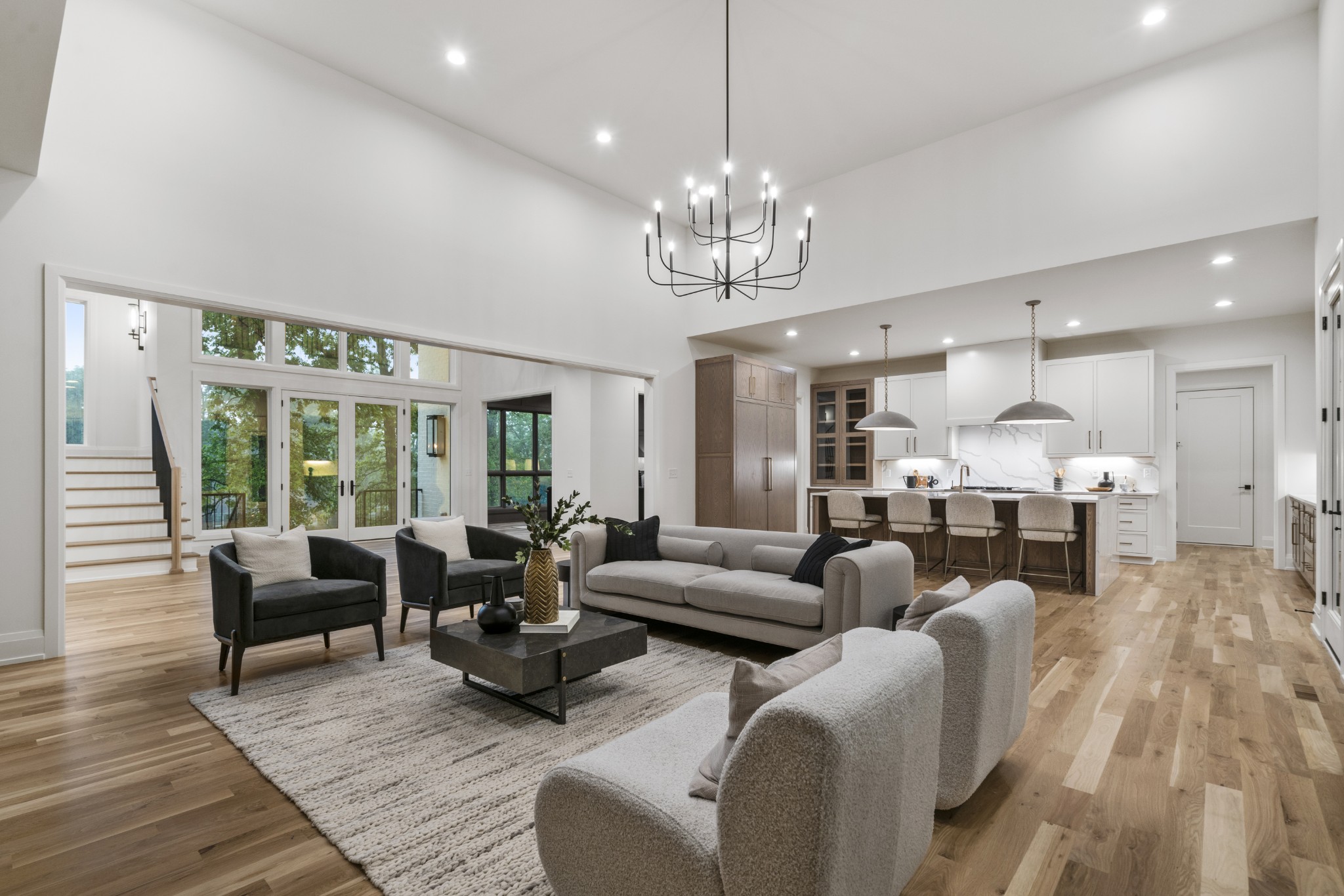 1323 Harding Place Nashville, TN 37215 - Photo 8 of 41 a living room with furniture or kitchen view and a chandelier