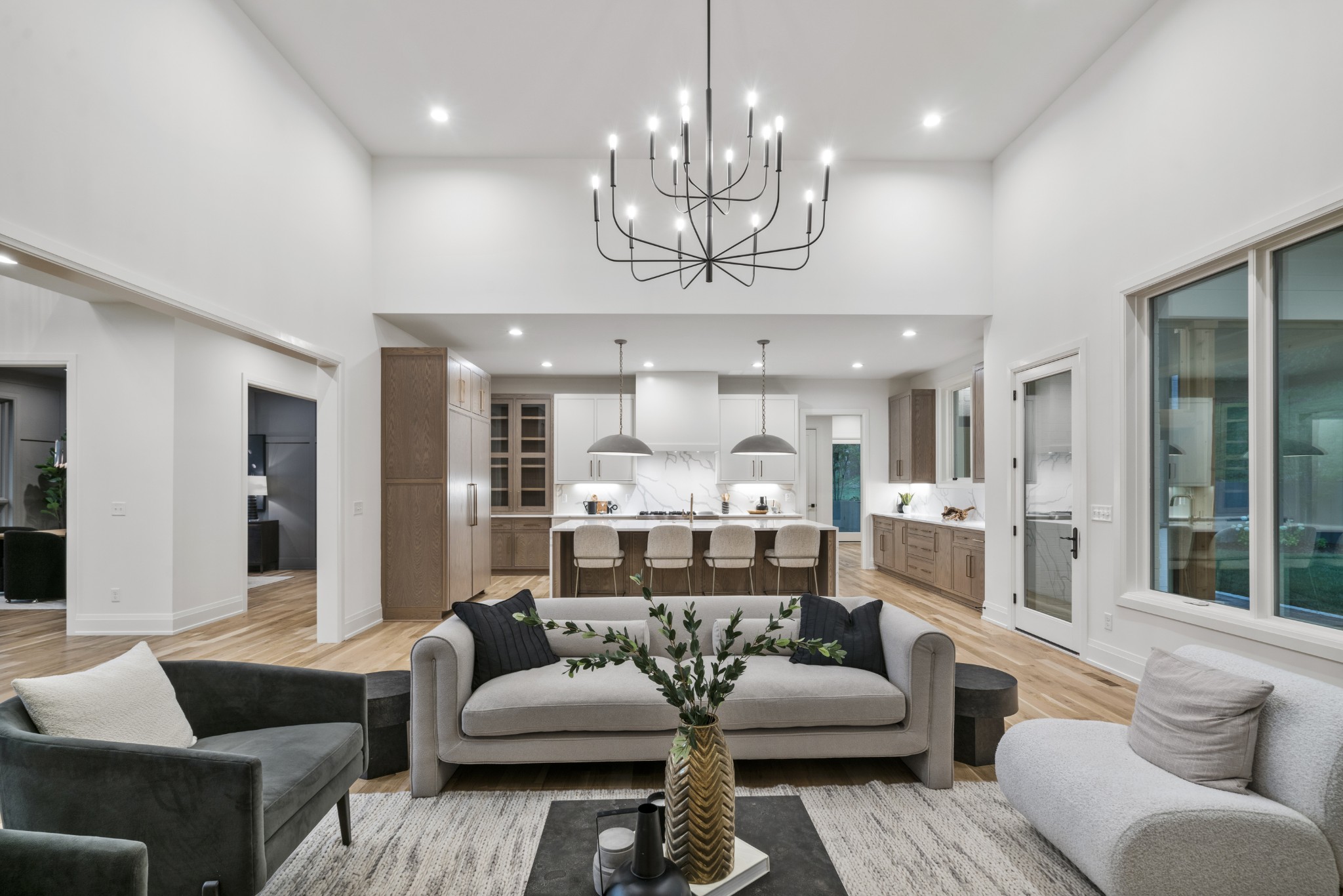 1323 Harding Place Nashville, TN 37215 - Photo 9 of 41 a living room with furniture chandelier and a large window