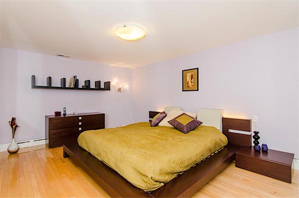 59 Wallis Road Brookline, MA 02467 - Photo 12 of 28 a bedroom with a bed and a desk