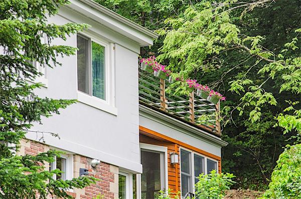 59 Wallis Road Brookline, MA 02467 - Photo 28 of 28 front view of a house with a tree