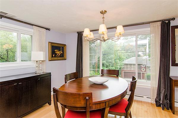 59 Wallis Road Brookline, MA 02467 - Photo 6 of 28 a view of a dining room with furniture window and outside view